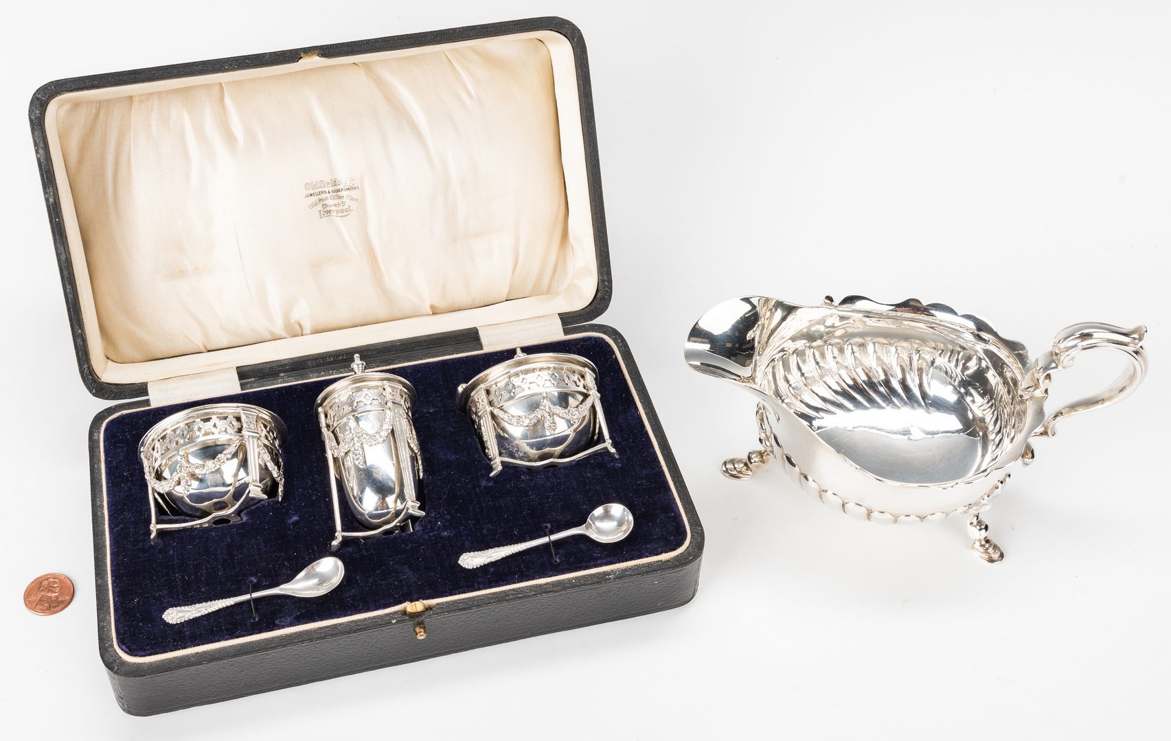 Lot 214: Edwardian Cased Sterling Condiment Set and Sauce Boat