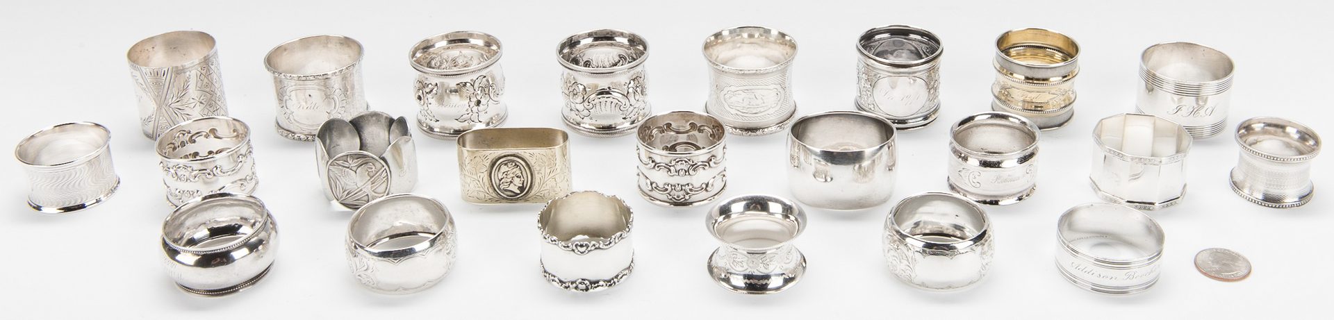 Lot 217: Collection of 23 Silver Napkin Rings