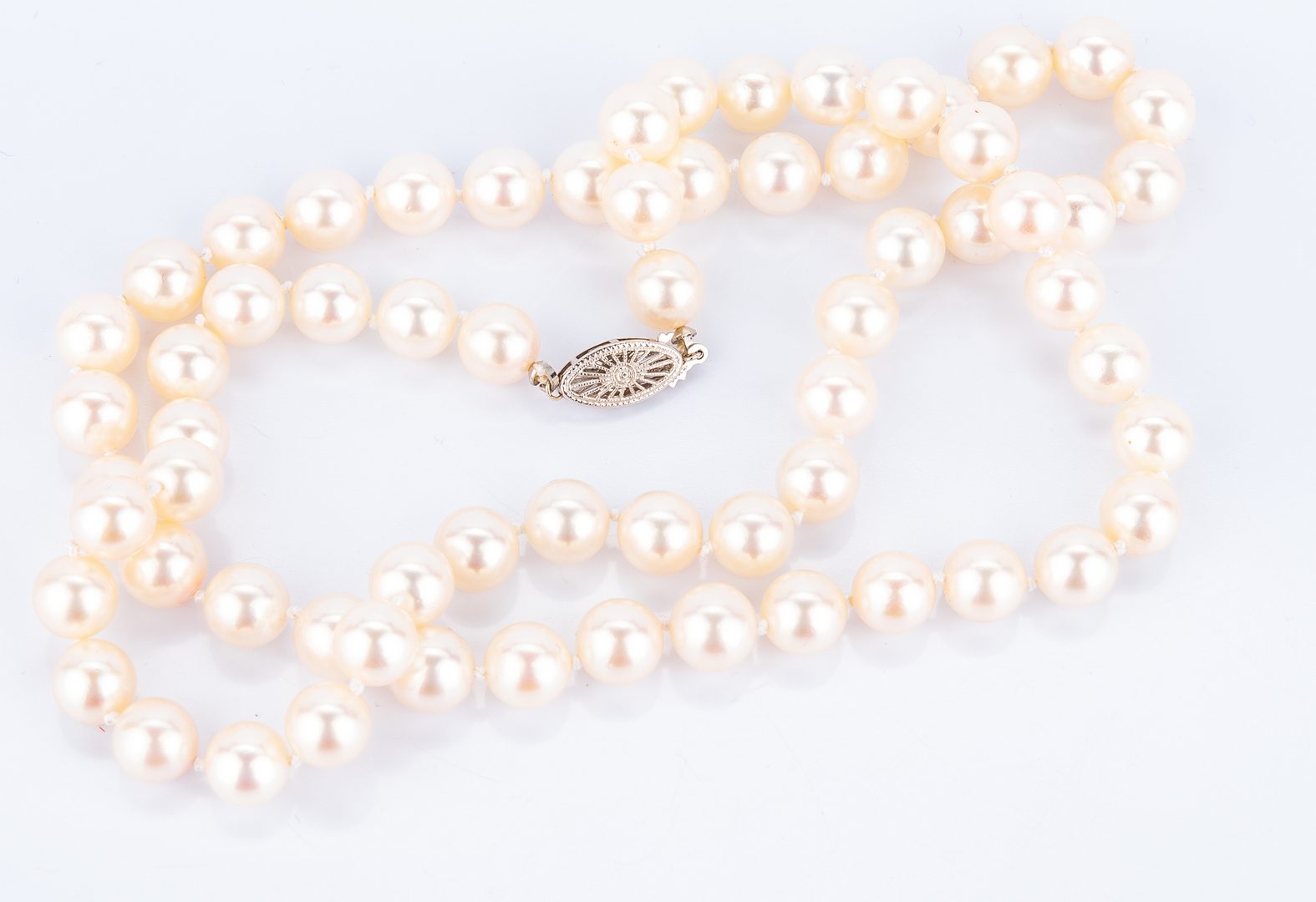 Lot 398: Mikimoto 24" 8 x 8.5 mm Pearls