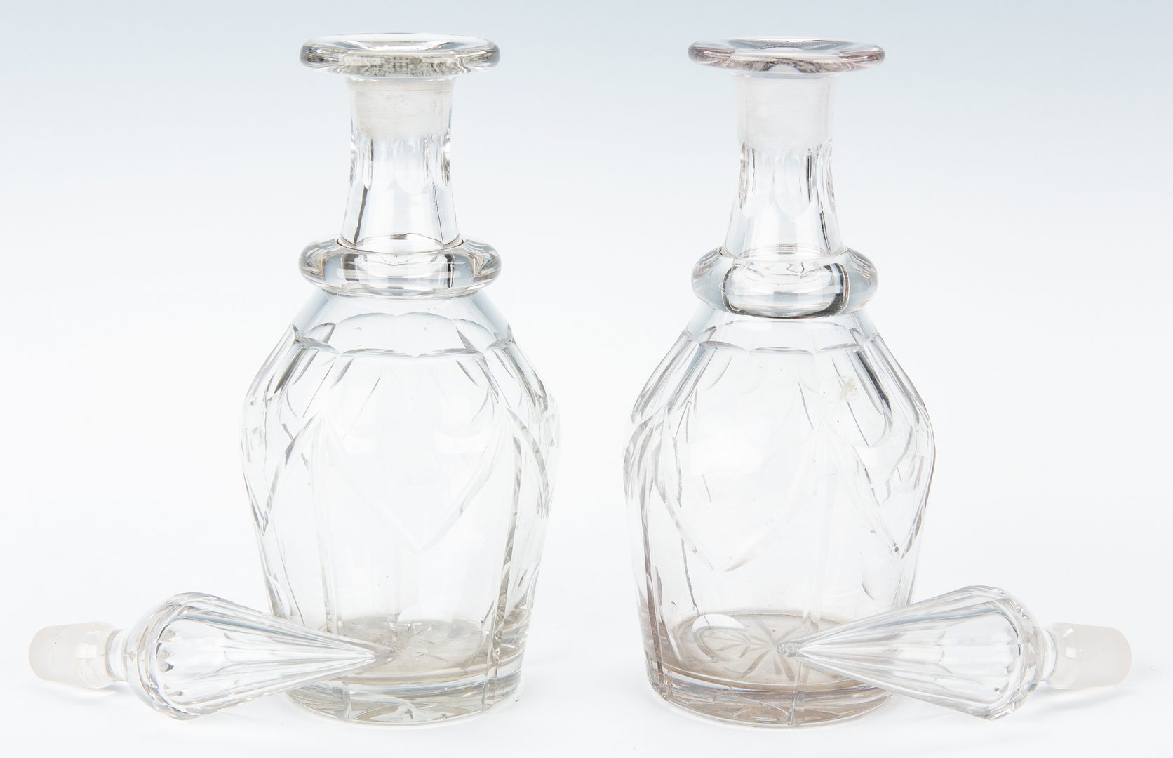 Lot 243: Anglo-Irish Cut-Crystal: 3 Decanters & 1 Fruit Bowl