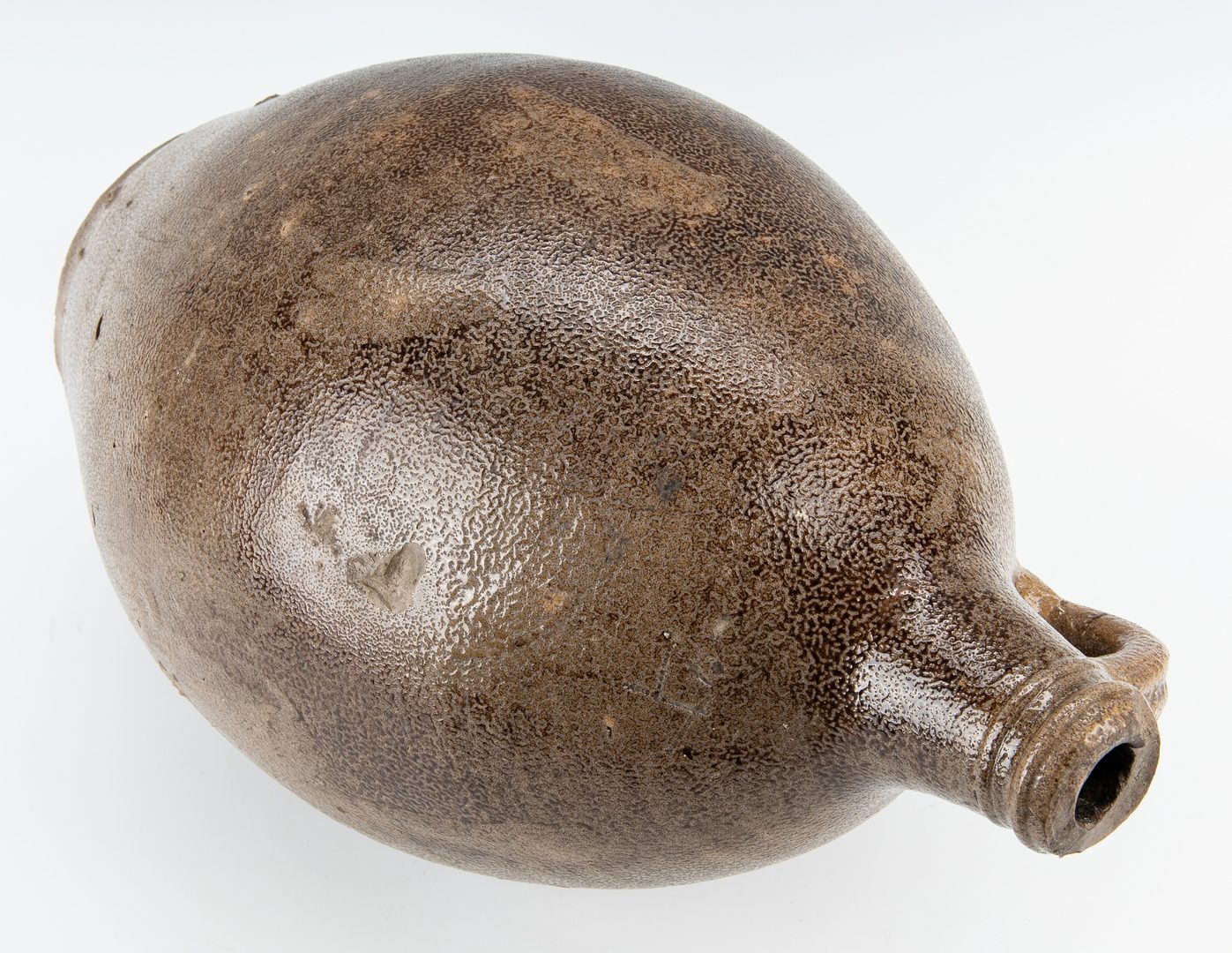 Lot 257: German Bellarmine Stoneware jug, 18th century