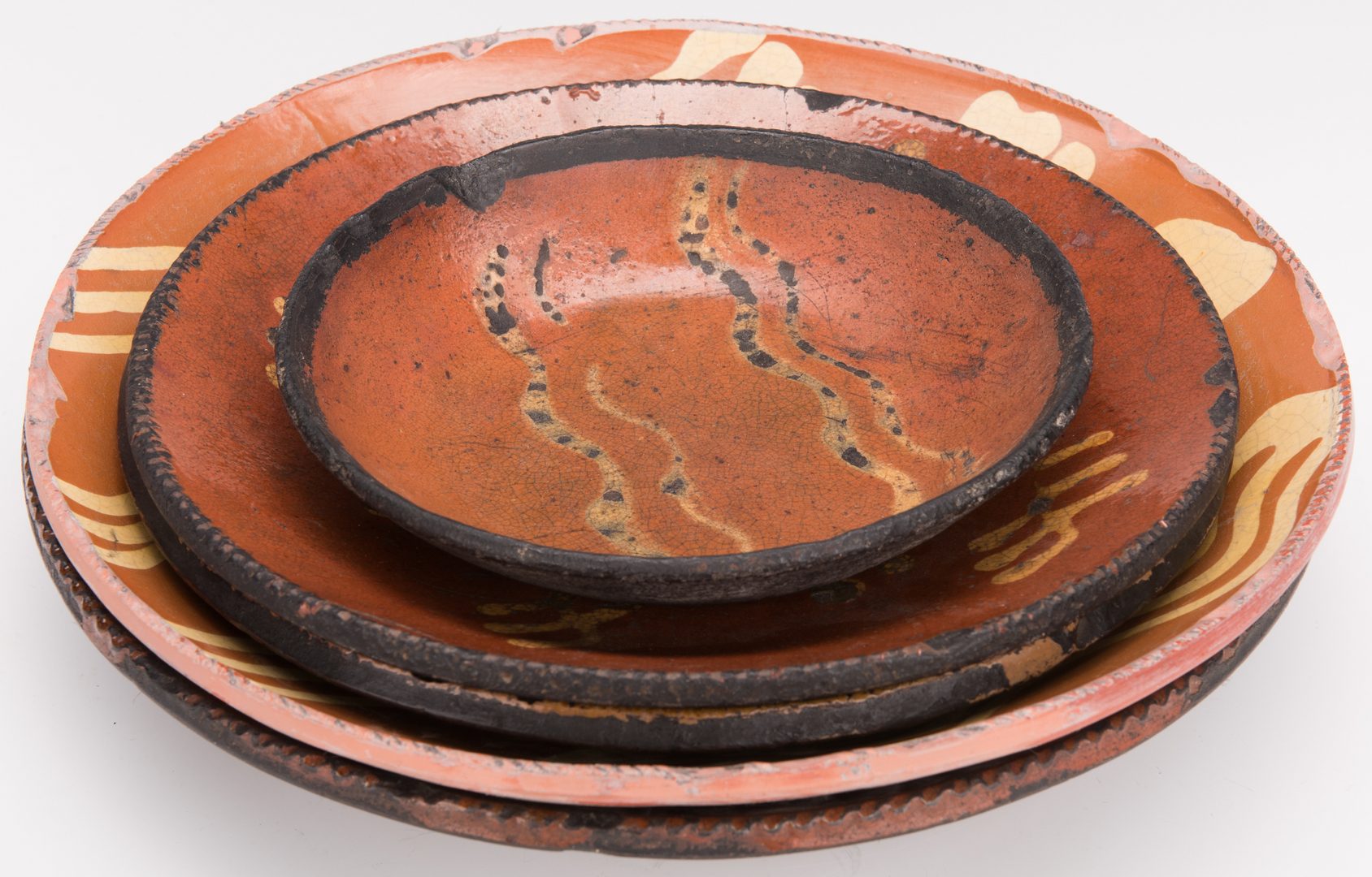 Lot 260: 5 Slipware Decorated Redware Pieces, incl 19th Cent.