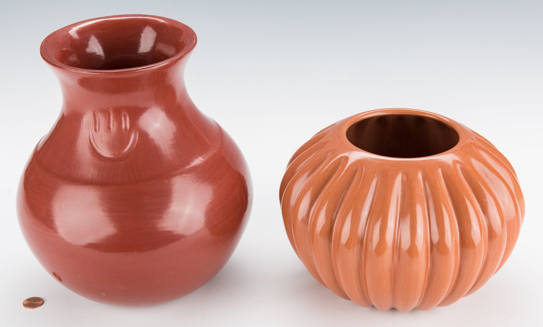 Lot 305: 2 Santa Clara Pottery Jars: Garcia and Komalestewa