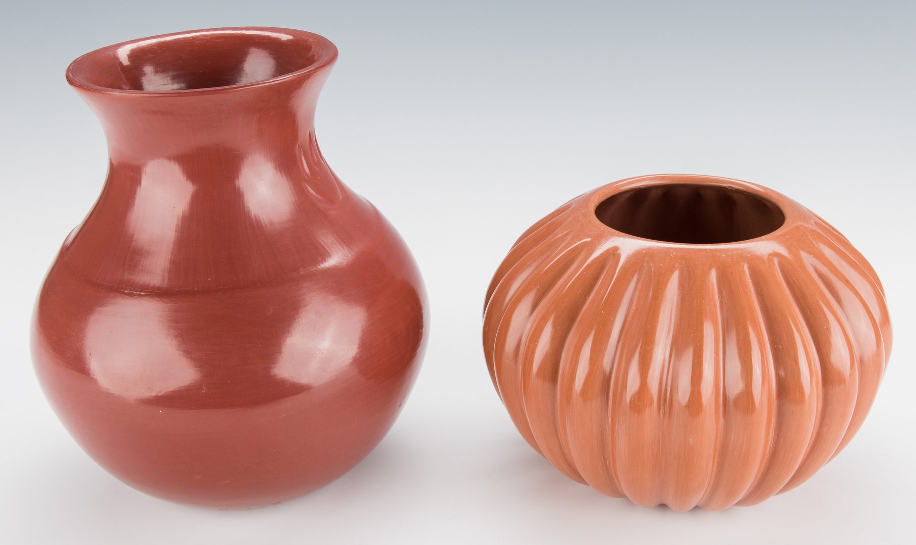 Lot 305: 2 Santa Clara Pottery Jars: Garcia and Komalestewa