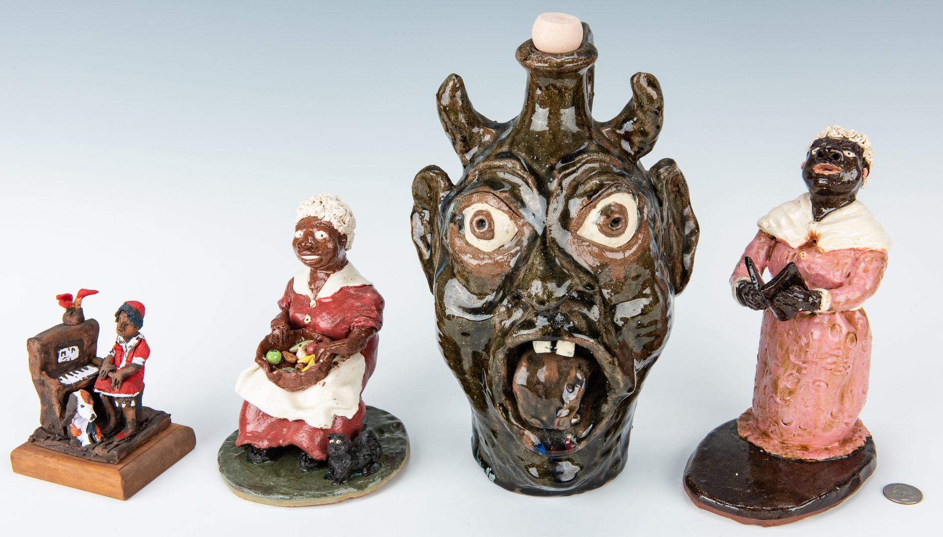 Lot 313: 4 Ceramic Folk Art Items, inc. figures