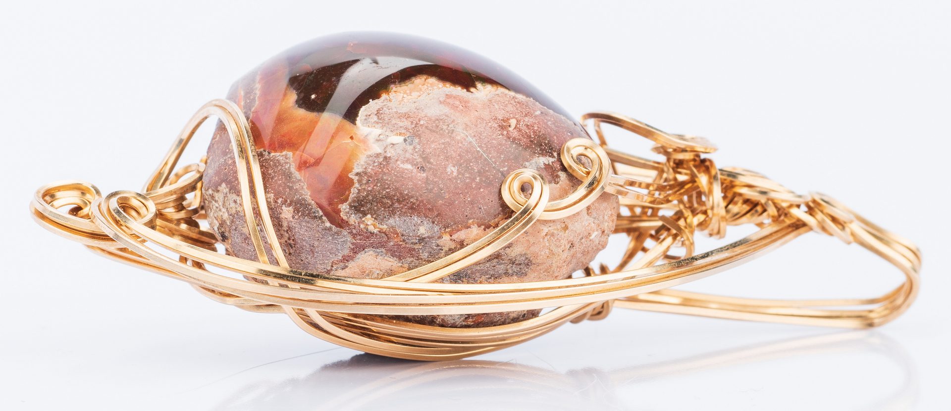 Lot 33: Ethiopian Fire Opal in Gold Pendant Mounting