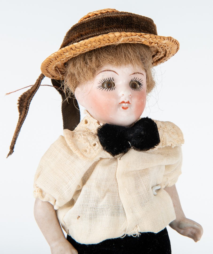 Lot 427: 2 German Dolls + 1 boy doll with dome