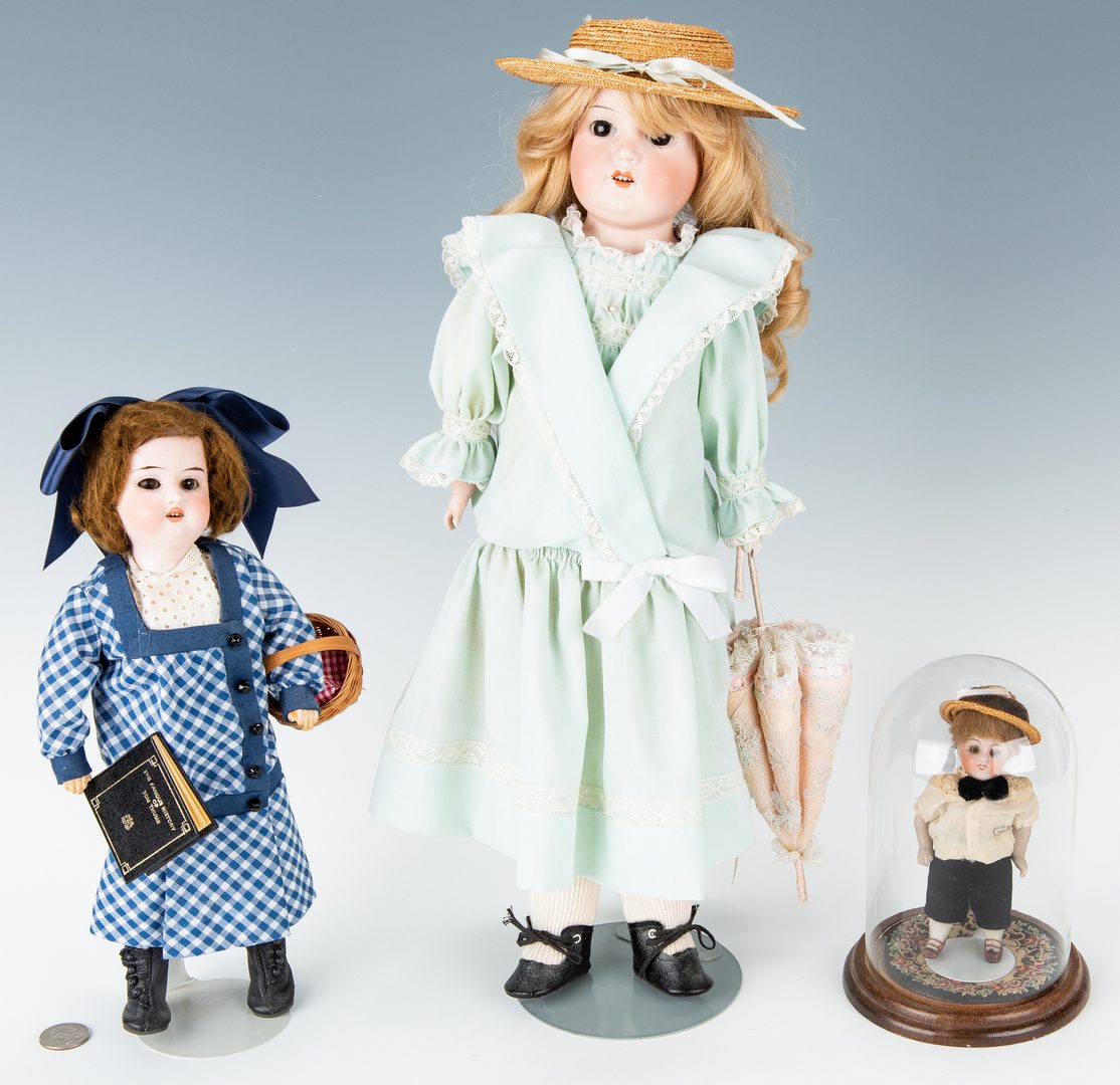 Lot 427: 2 German Dolls + 1 boy doll with dome
