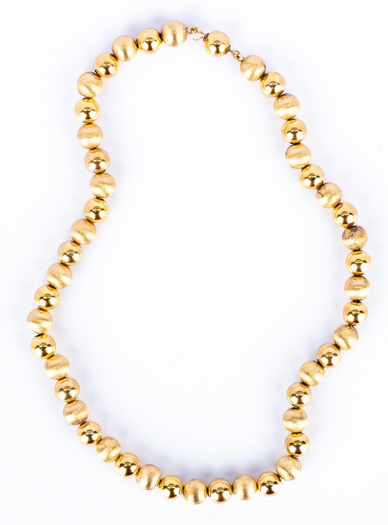 Lot 186: Set of 2 14K Bead Necklaces | Case Auctions