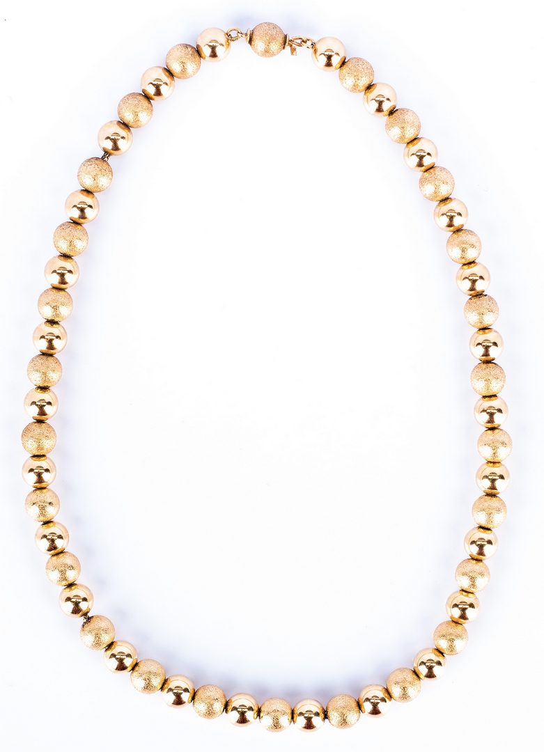 Lot 186: Set of 2 14K Bead Necklaces
