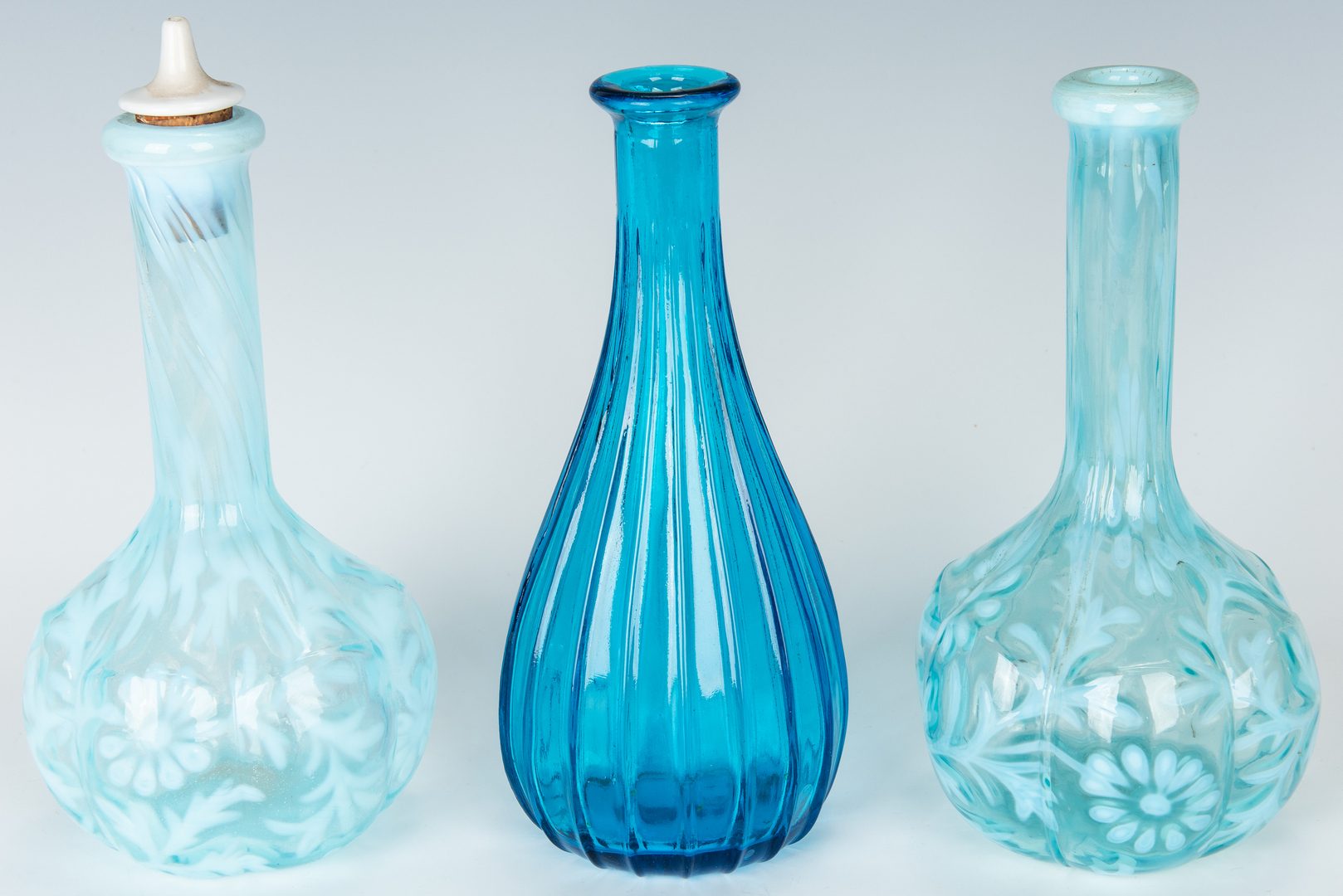 Lot 221: Collection of 15 Art Glass Barber Bottles