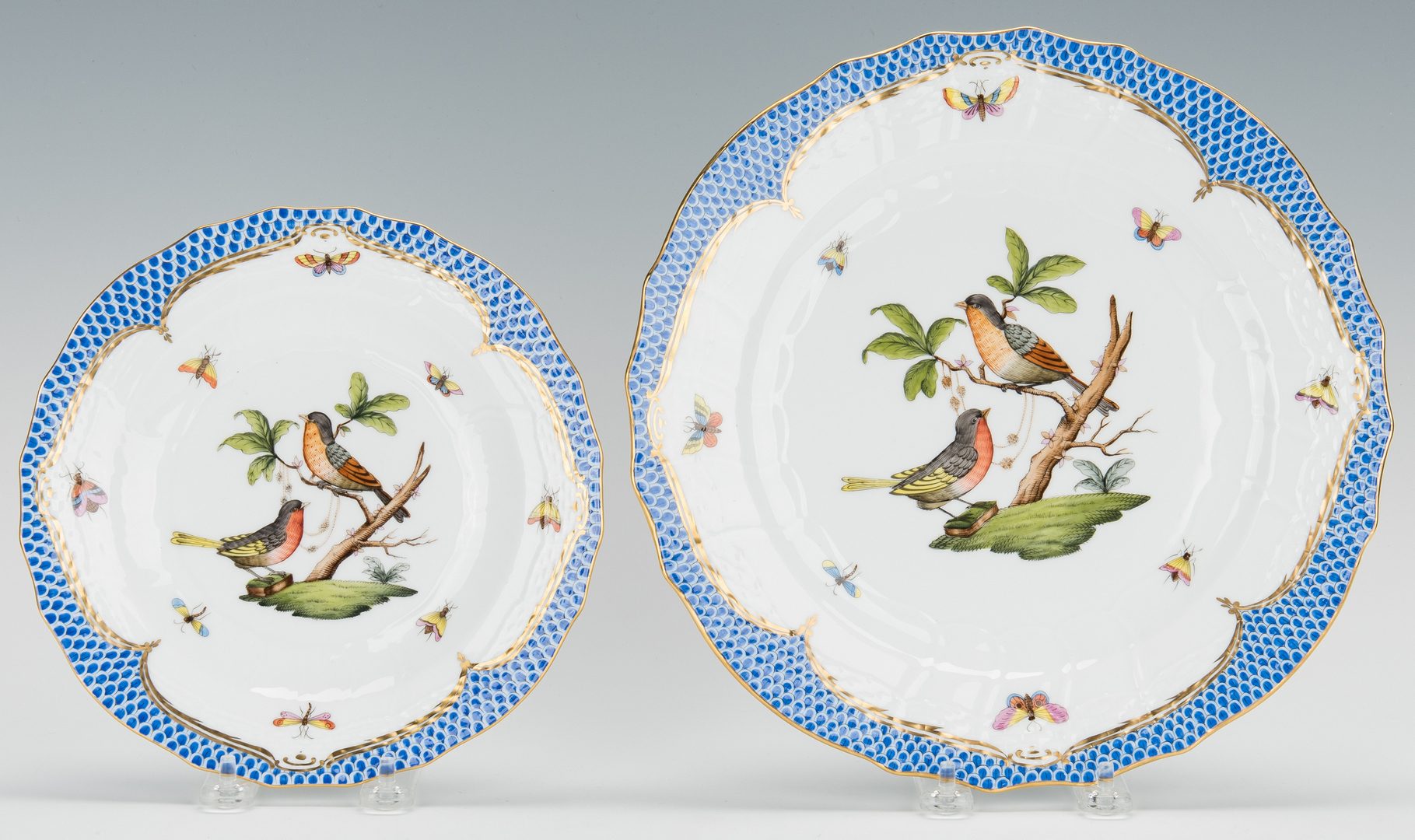Lot 231: Herend Rothschild Bird Blue Border, 28 Plates