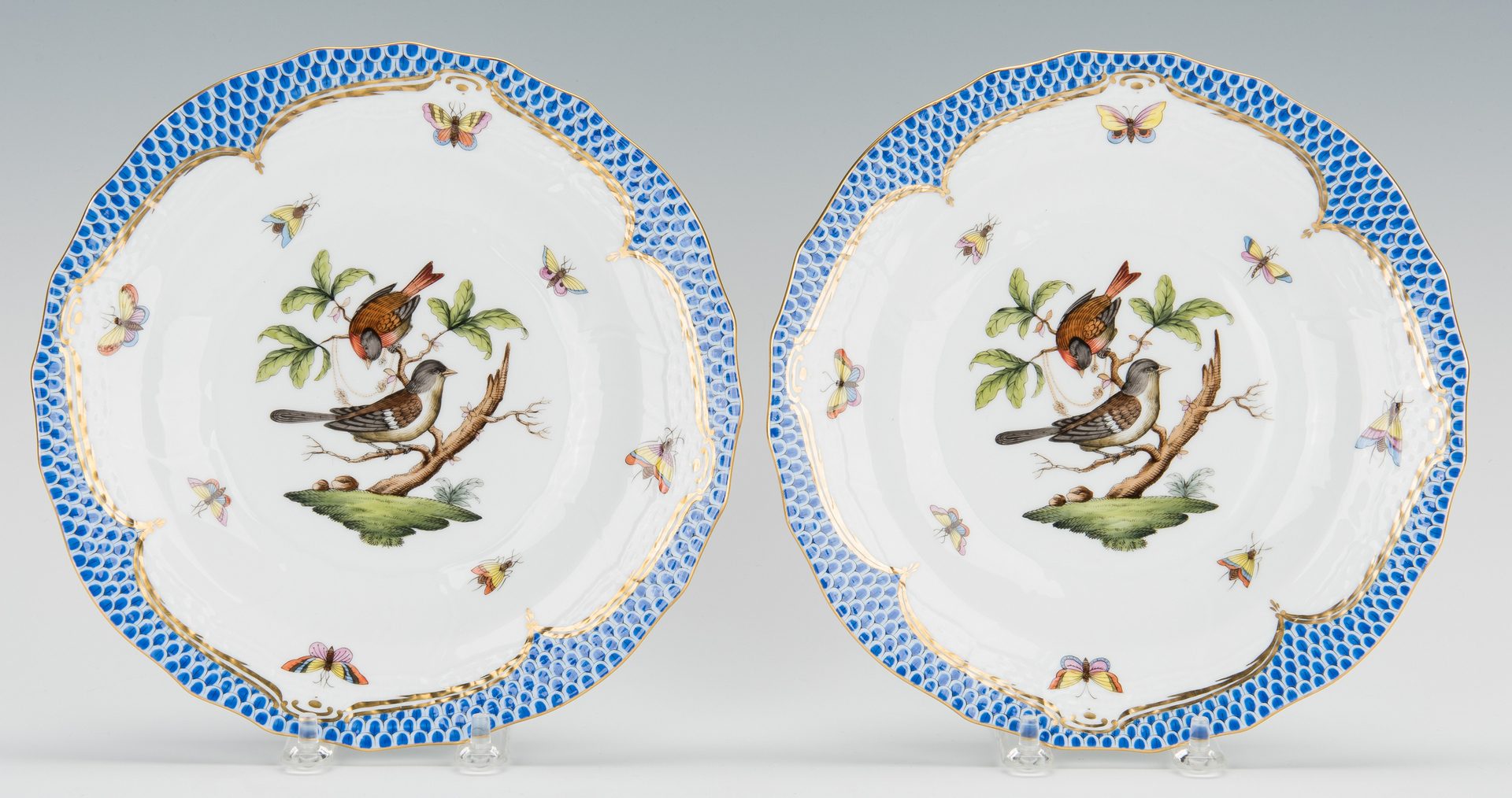 Lot 231: Herend Rothschild Bird Blue Border, 28 Plates