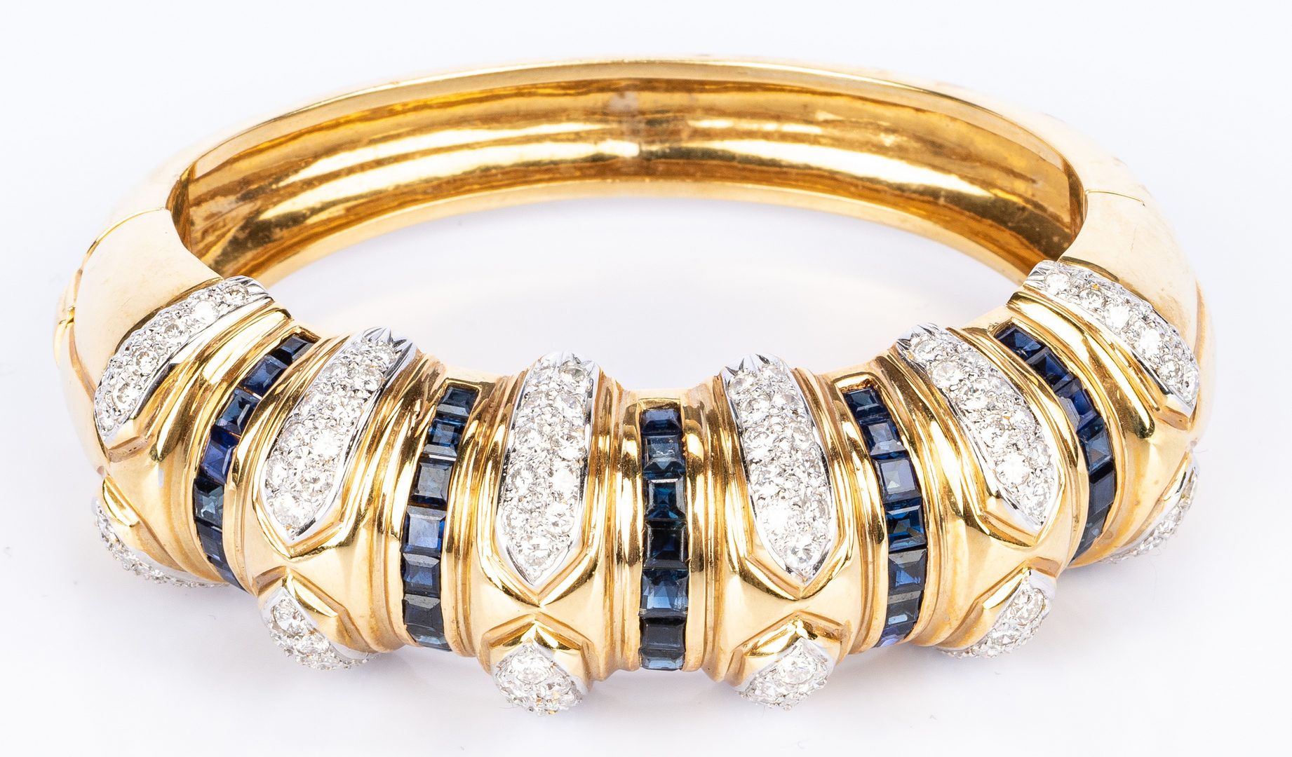 Lot 34: 18K Sapphire Diamond Fashion Bangle Bracelet