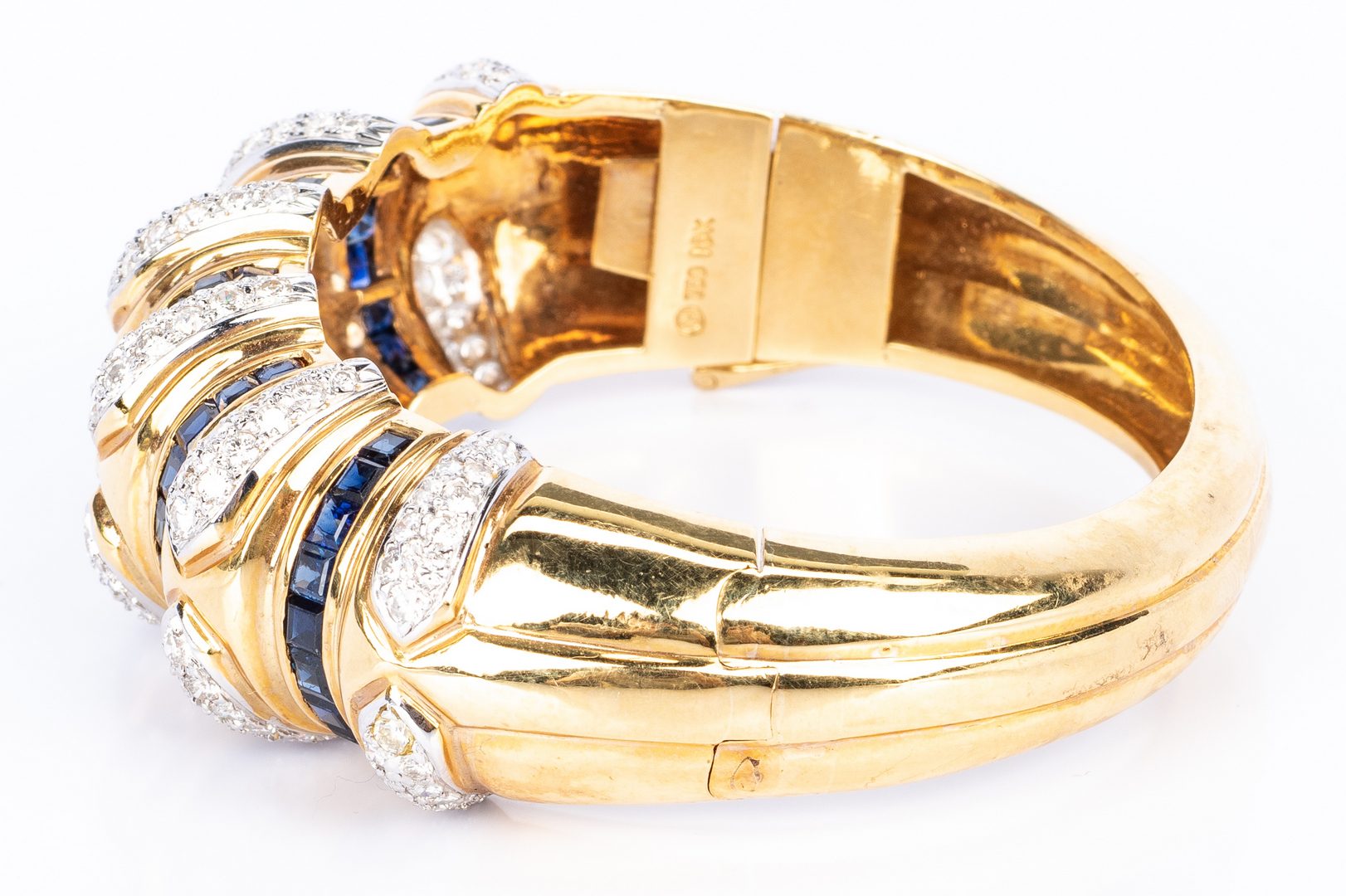 Lot 34: 18K Sapphire Diamond Fashion Bangle Bracelet