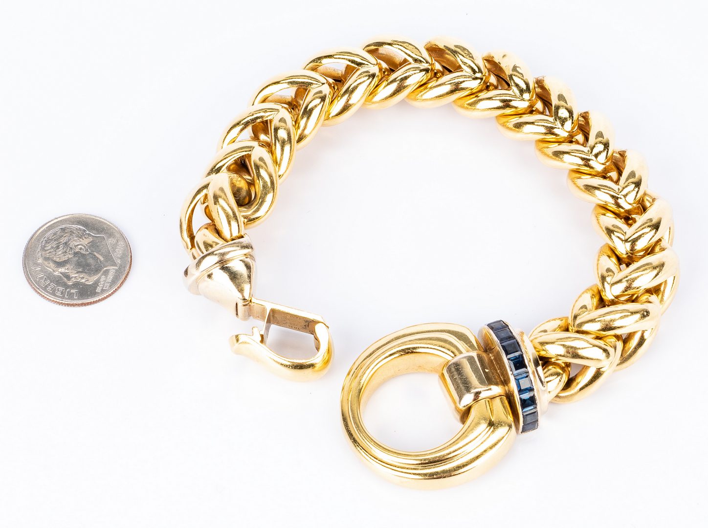 Lot 39: 18K Signoretti Bracelet with Sapphires