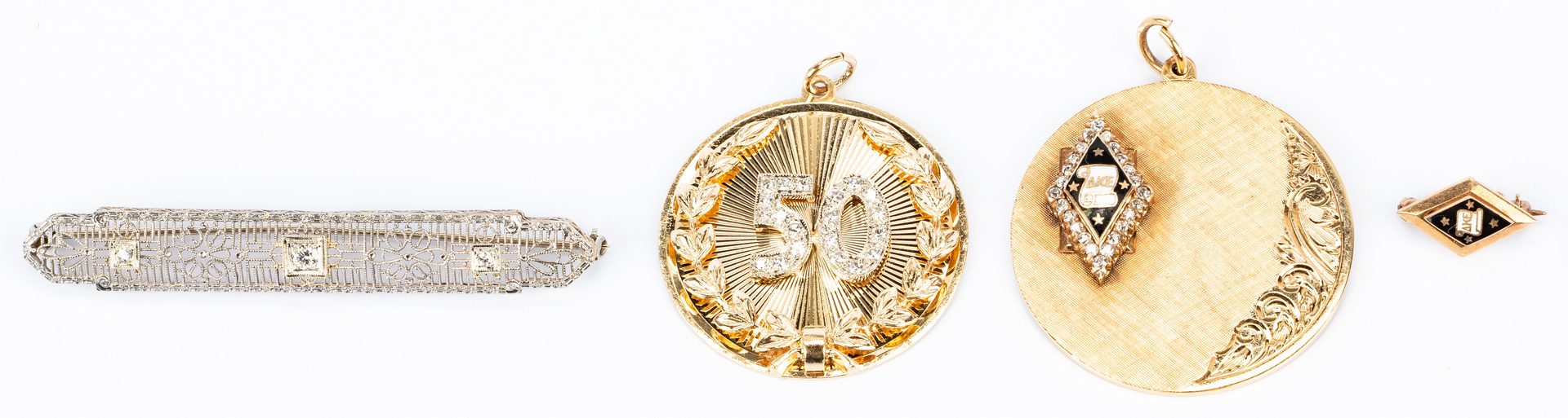 Lot 668: Assorted Gold and Diamond Vintage jewelry, 4 items