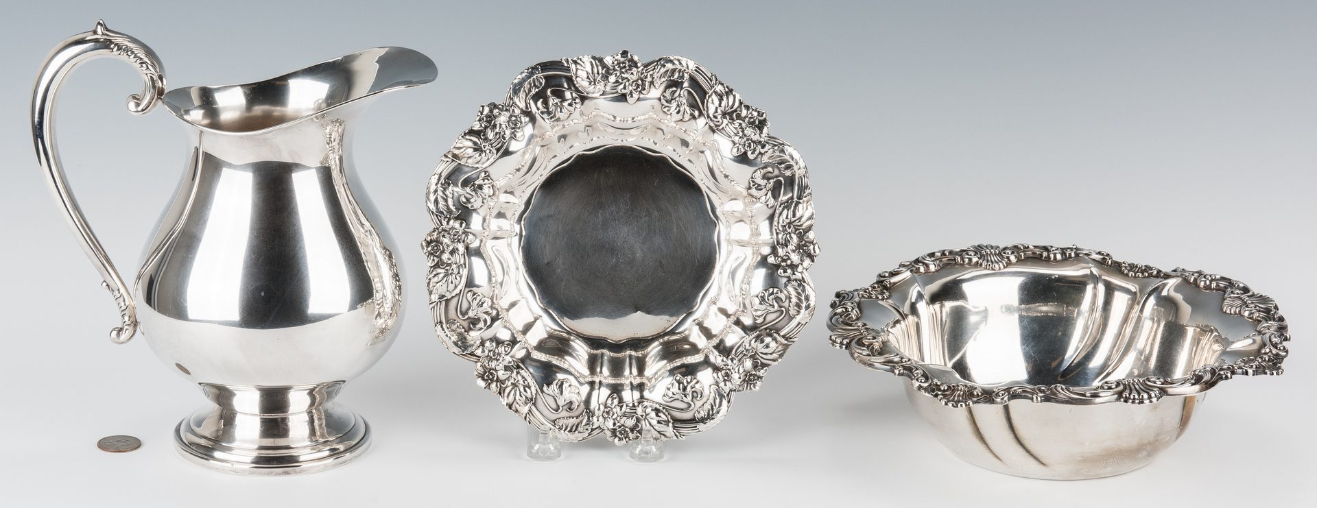 Lot 700: 3 Sterling Silver Table Items, incl. Repousse