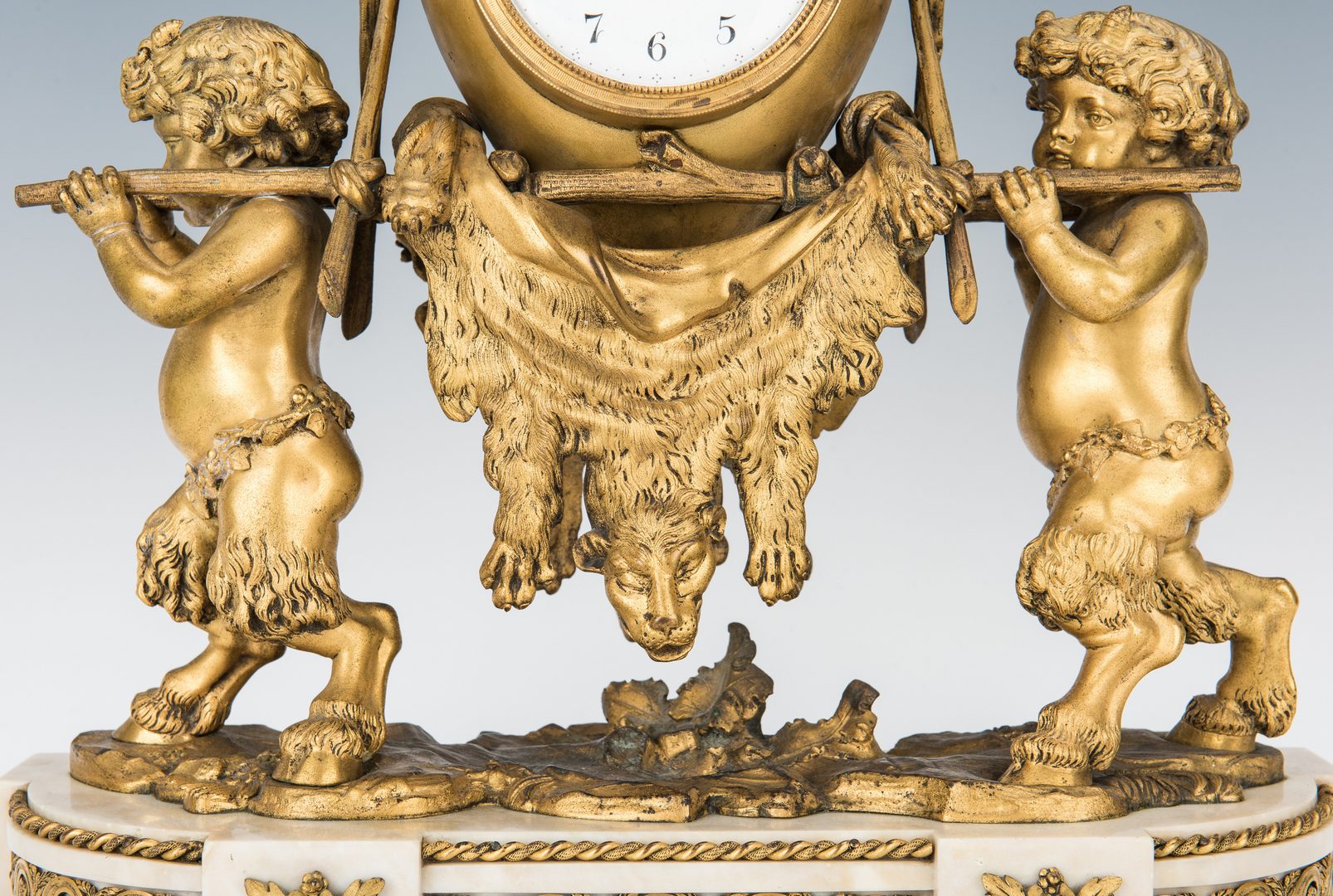 Lot 70: French Ormolu Clock and Garniture, Clodion