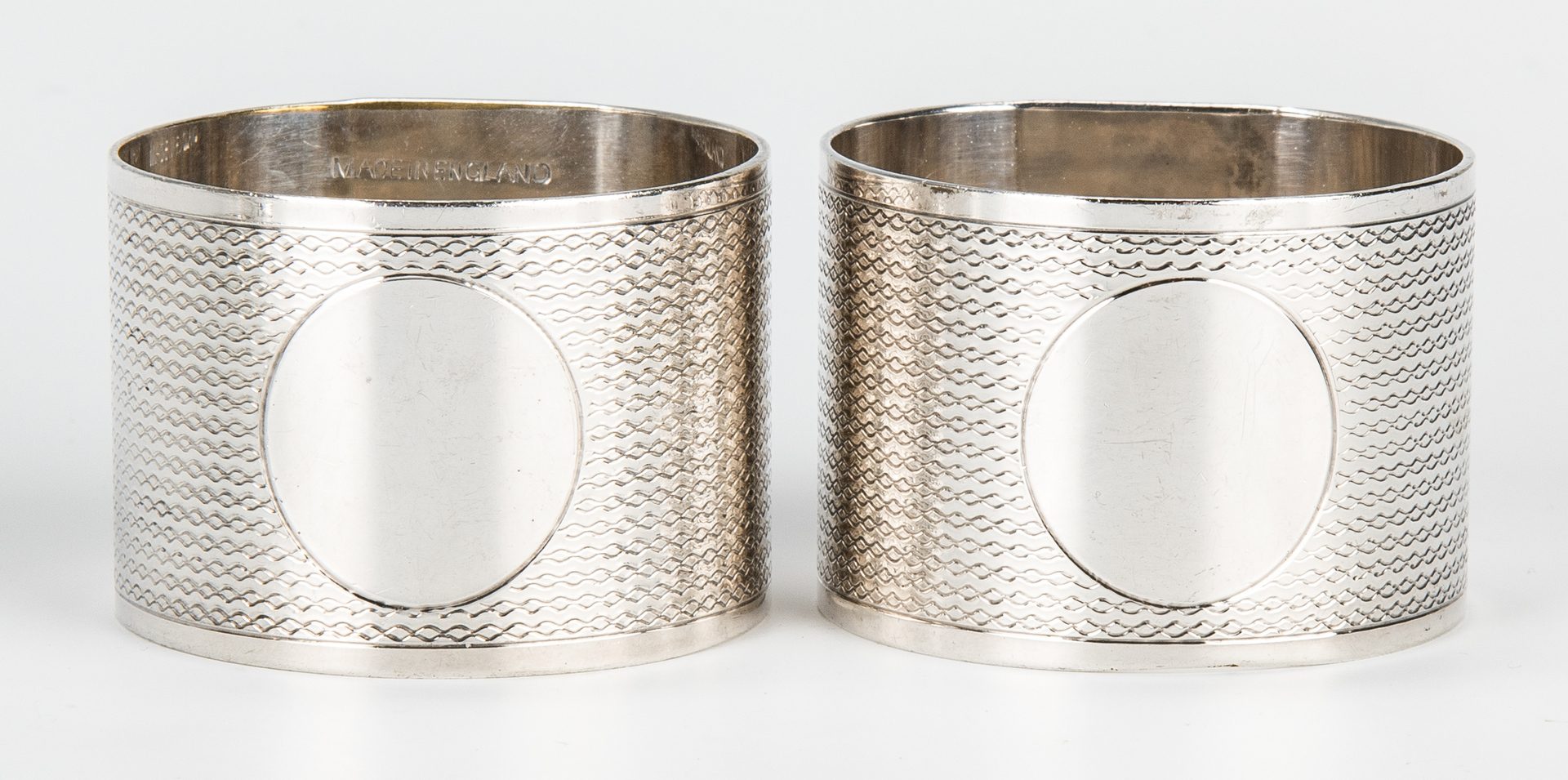 Lot 854: Assembled Group 31 Napkin Rings, most Sterling