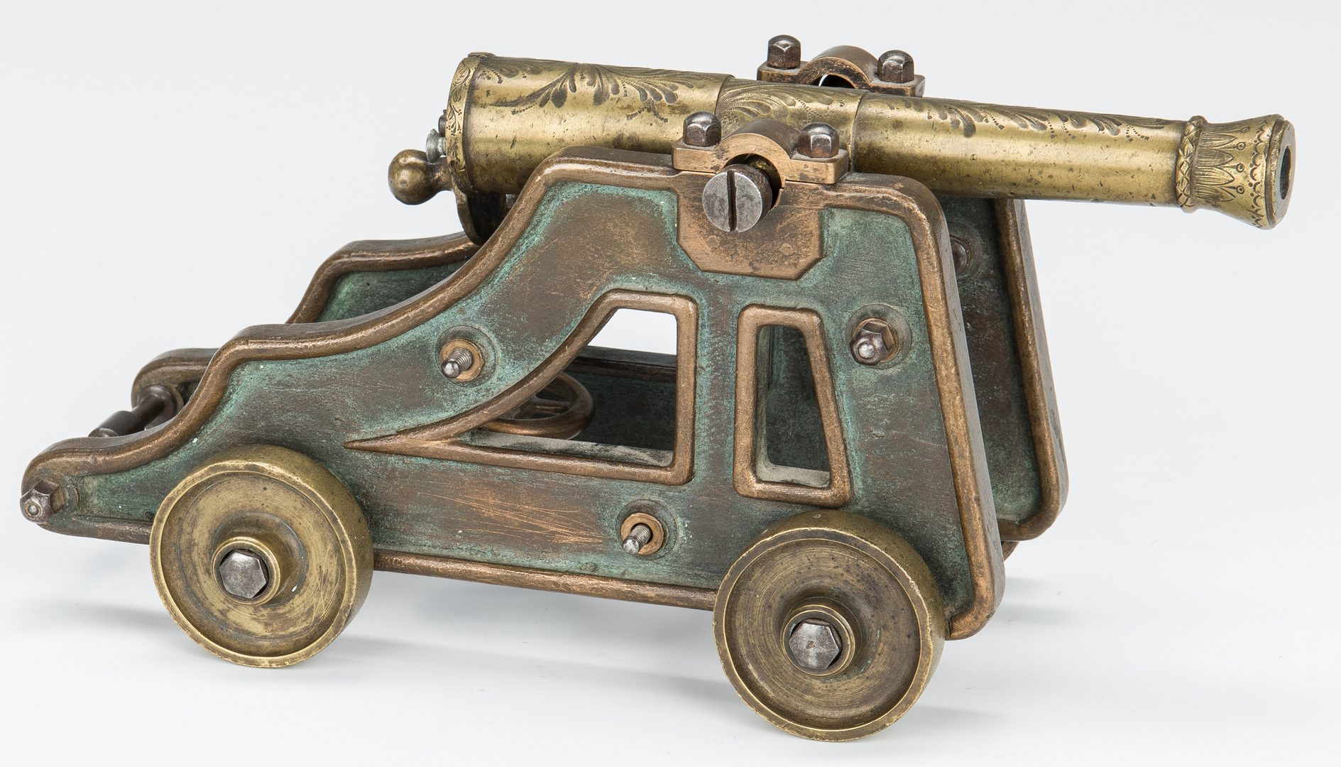 Lot 107: Grenfell Type Rug, Document Box, Inkwell, Miniature Bronze Cannon