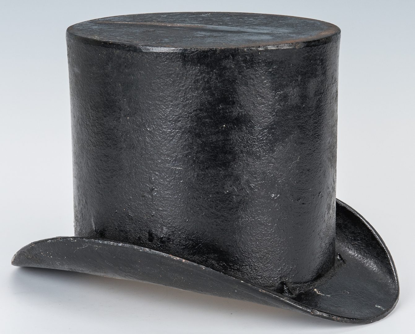 Lot 108: Cast Iron Top Hat Spittoon or Planter