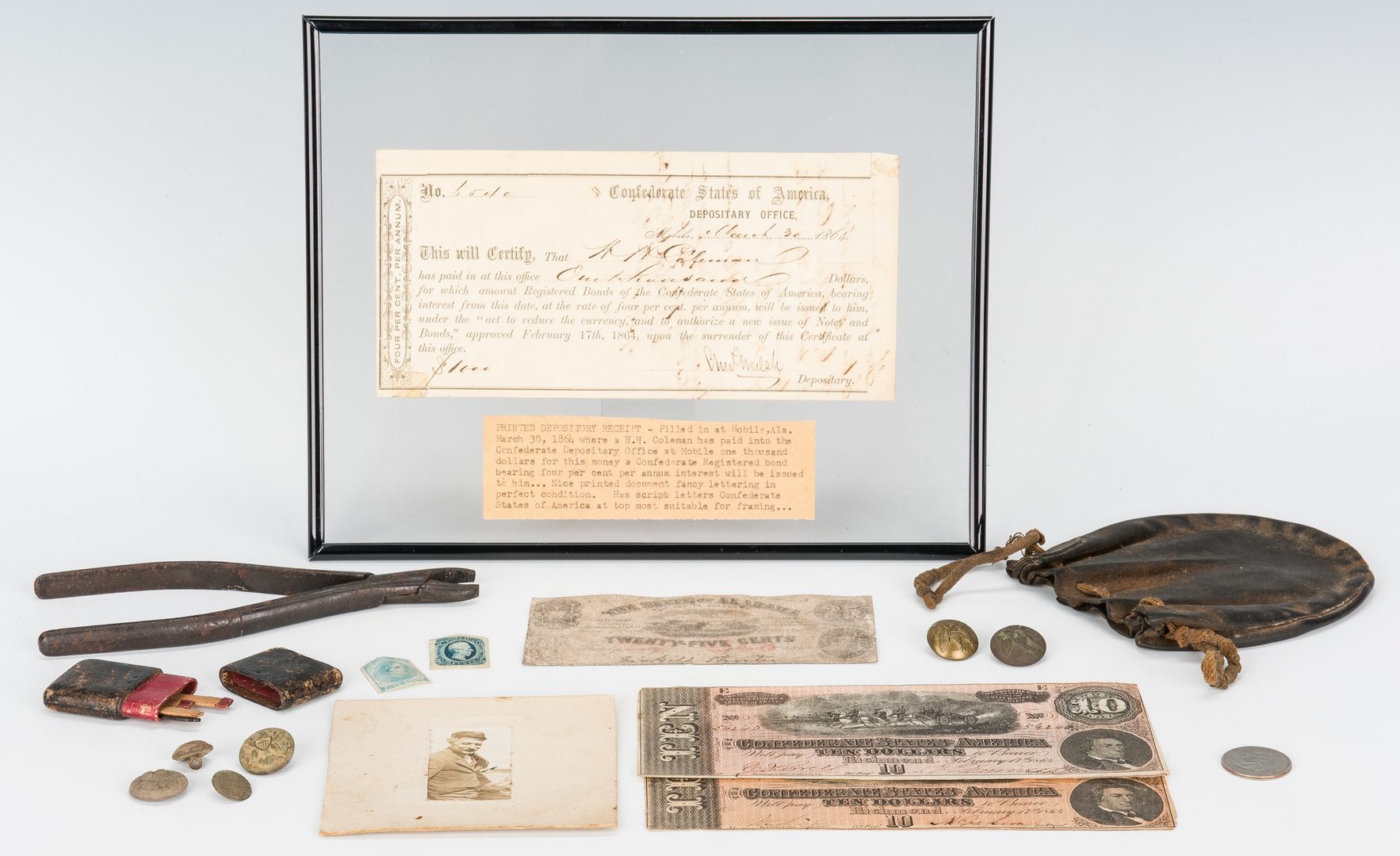 Lot 175: 15 Civil War items, incl. 1864 bond receipt, buttons