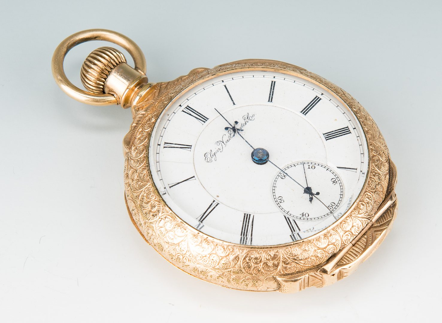 Lot 22: Elgin pocket watch; 10k Masonic pendant