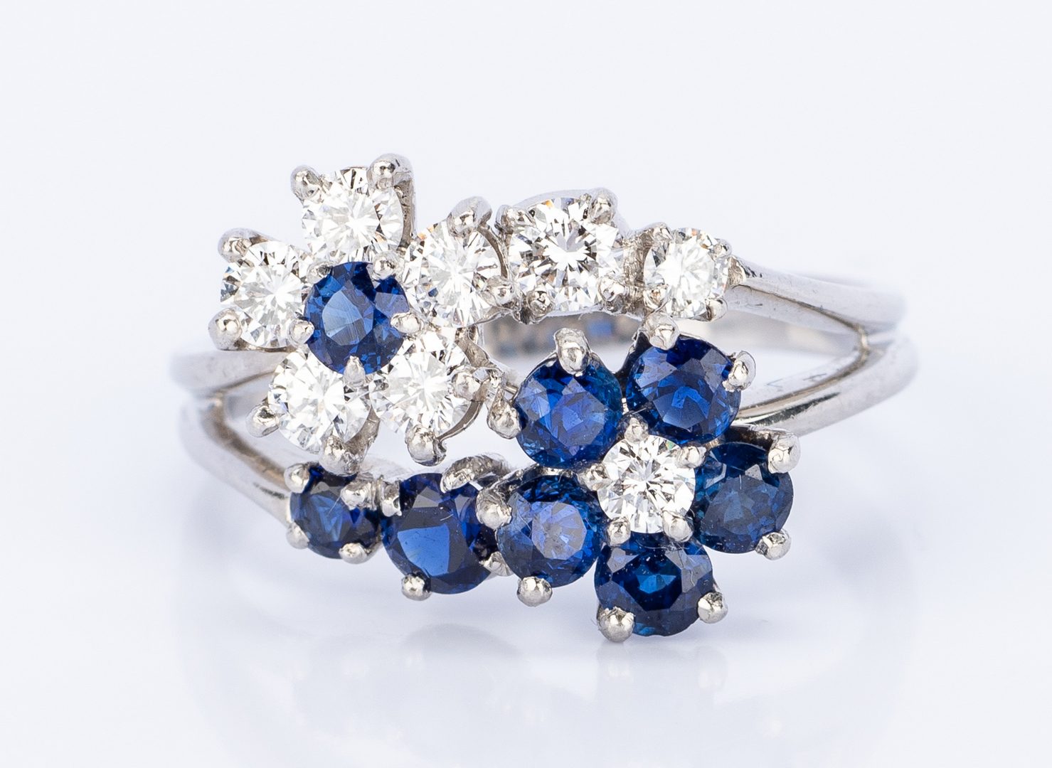 Lot 25: Plat. Diamond, Sapphire Flower Ring