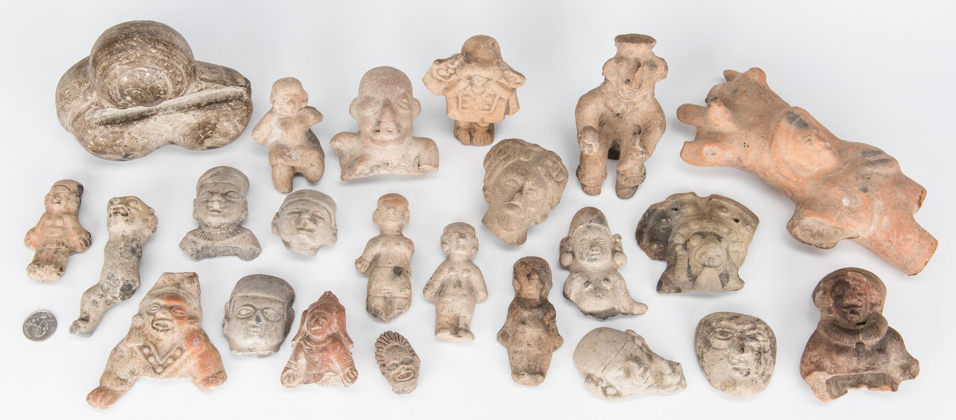 Lot 294: 23 Pre-Columbian Pottery and Stone Human Effigies