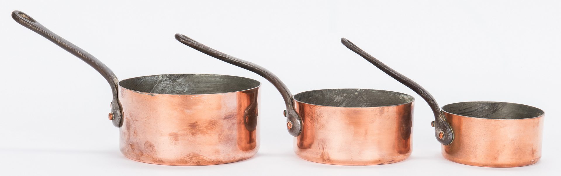 Lot 344: 7 Graduated Copper Pots