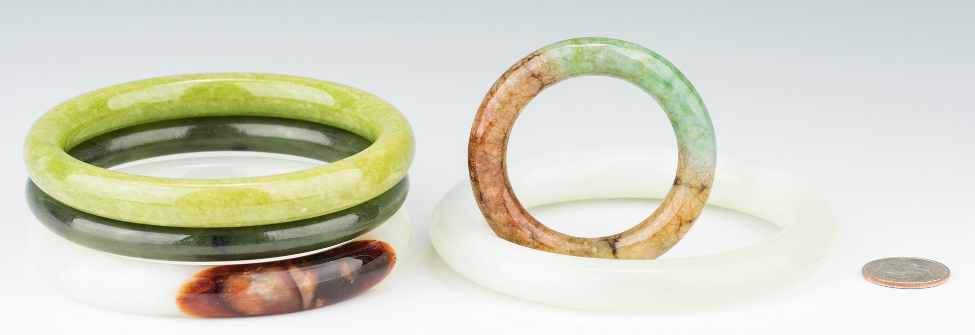 Lot 408: 5 Chinese Carved Jade Bangles