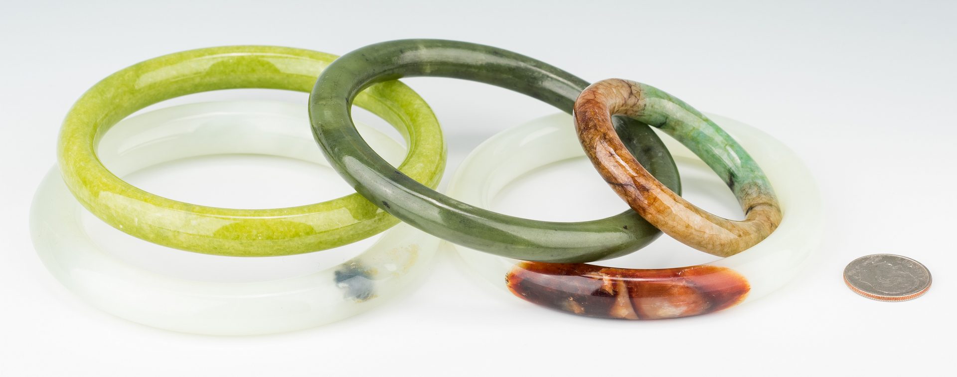 Lot 408: 5 Chinese Carved Jade Bangles