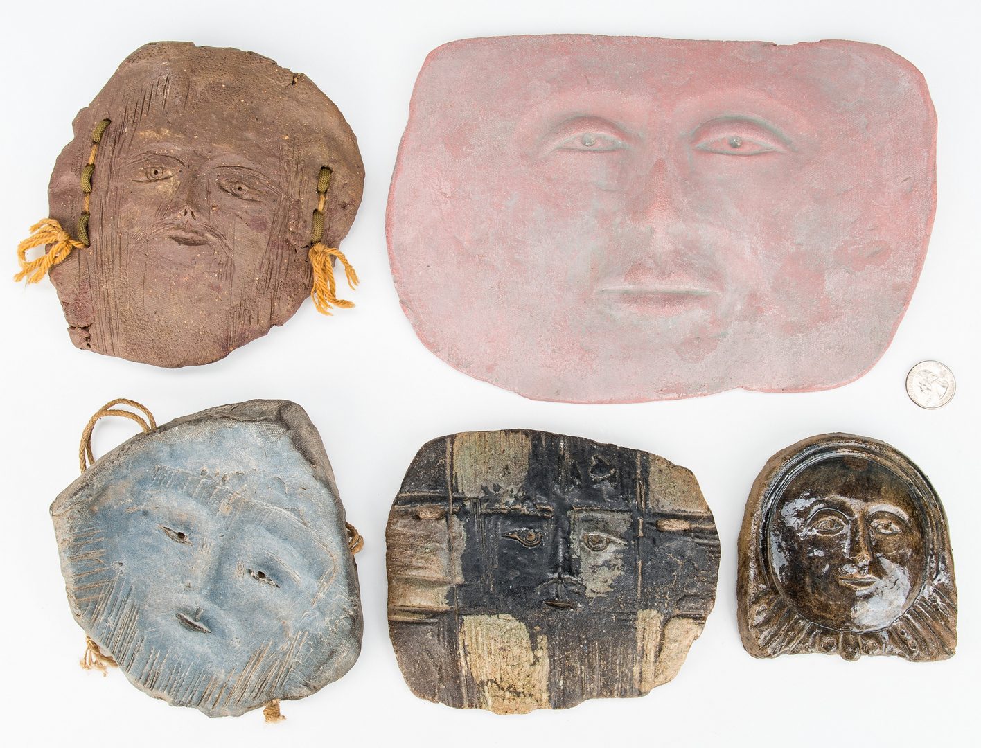 Lot 86: 5 Ceramic Faces by Olen Bryant