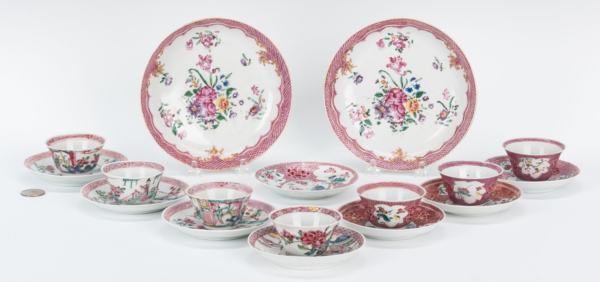 Lot 18: 17 Famille Rose cups, saucers, pink borders