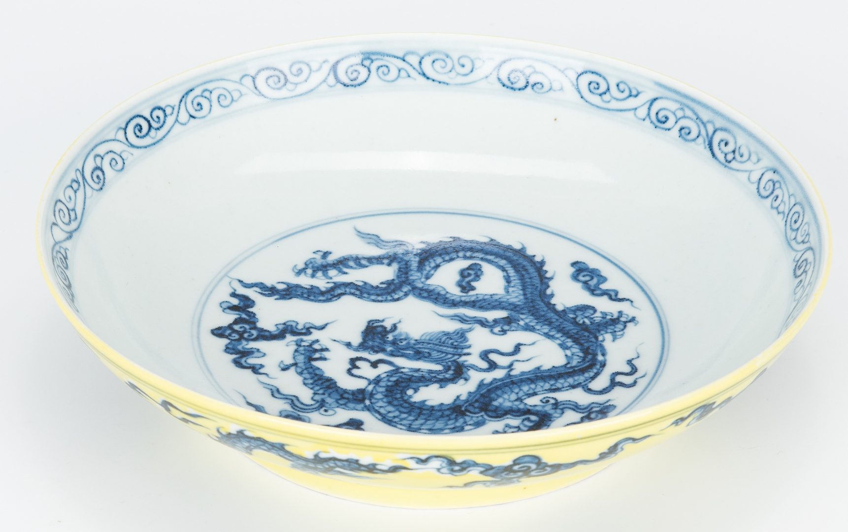 Lot 249: Ming Style Blue & White Dragon Dish w/ yellow clobbered decoration