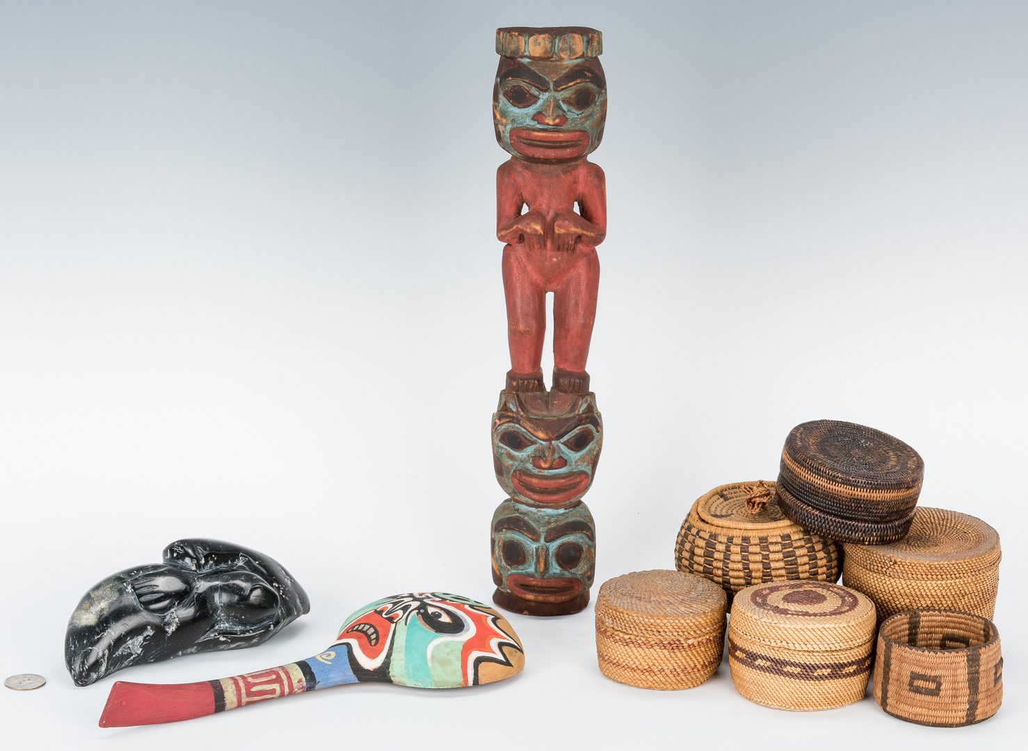 Lot 575: 9 Native American Items, incl. Baskets & Carvings