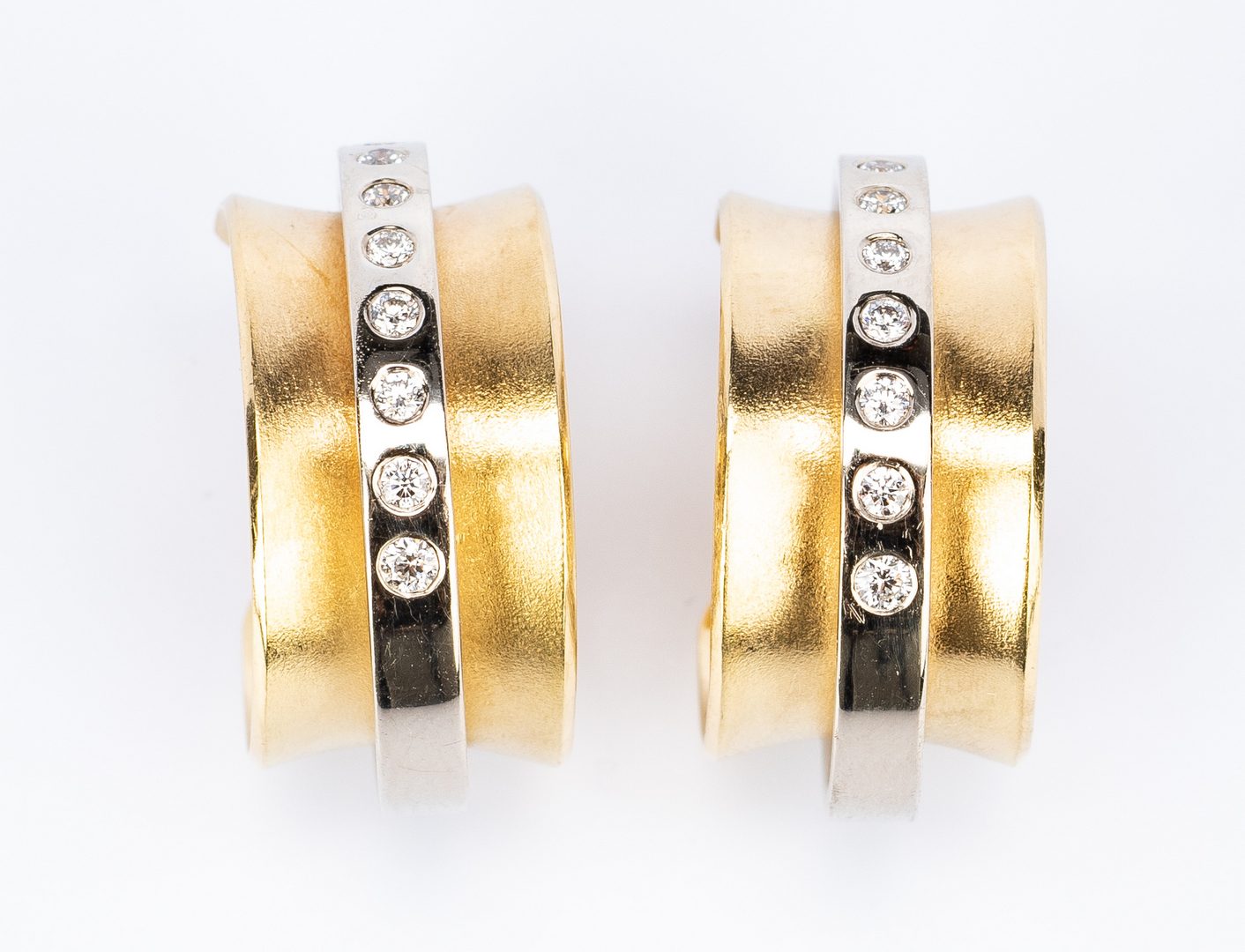 Lot 638: Ofiesh 18k Diamond Orbit Earrings