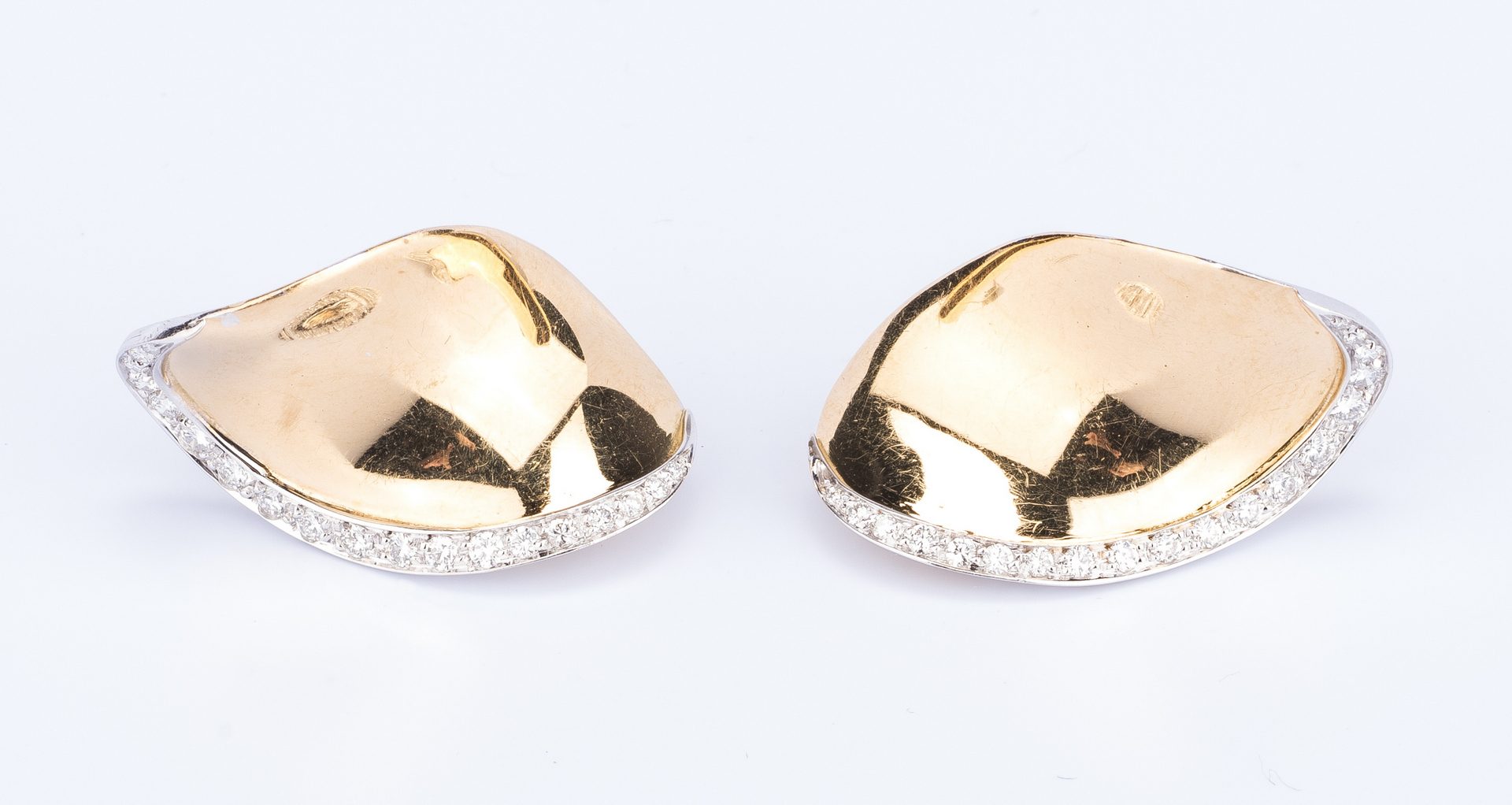 Lot 640: Scavia 18K Petal Diamond Earrings