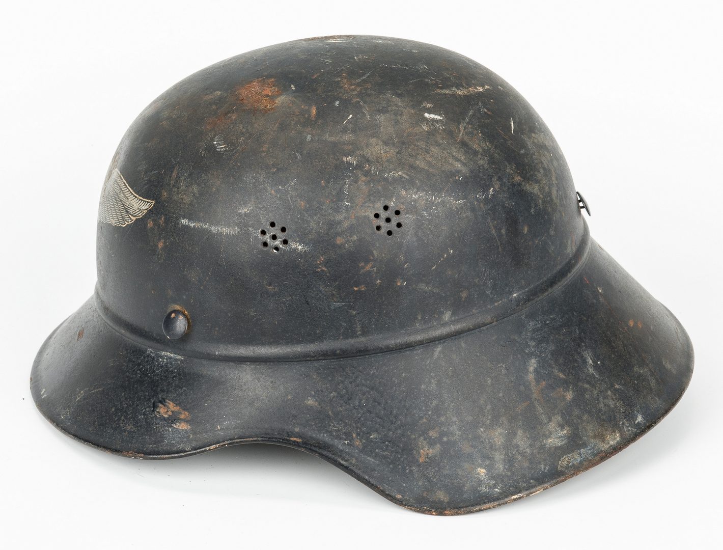Lot 725: WWII German Helmet & WWI Booklet, 2 items