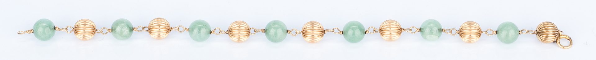 Lot 757: 7 Gold and Nephrite Jade Jewelry items