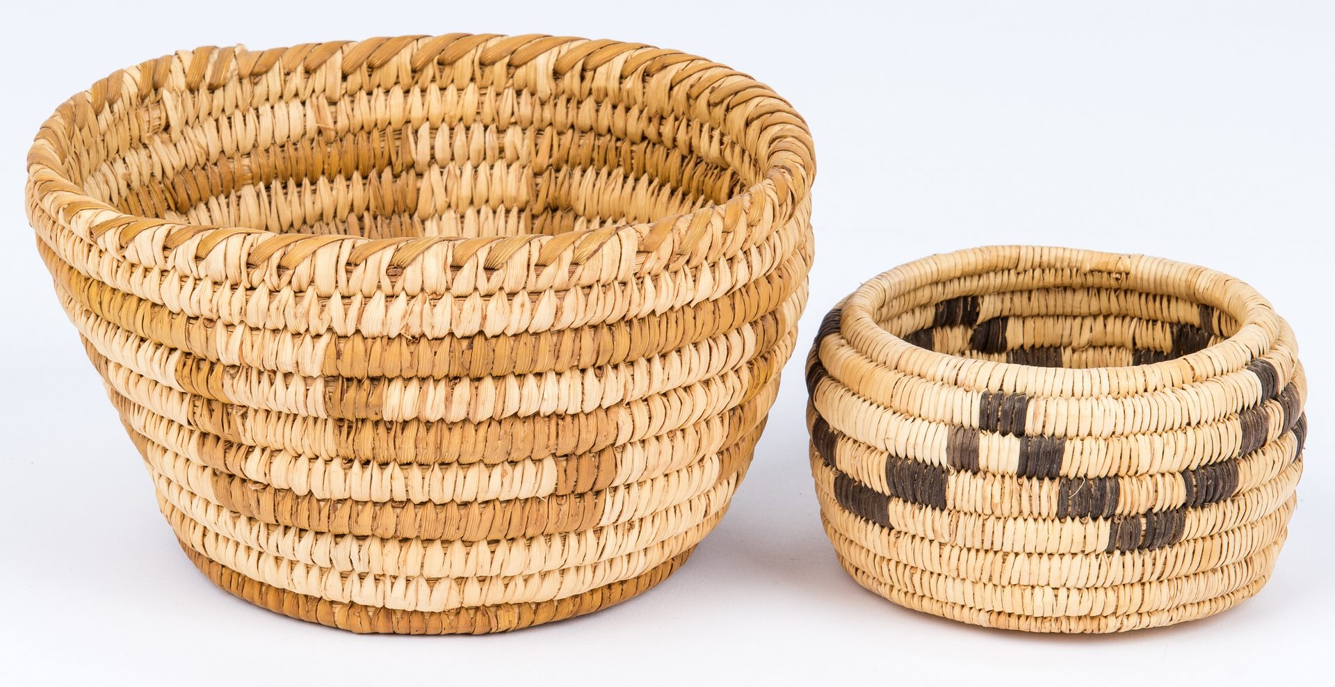 Lot 275: 9 Native American baskets, mostly Southwestern