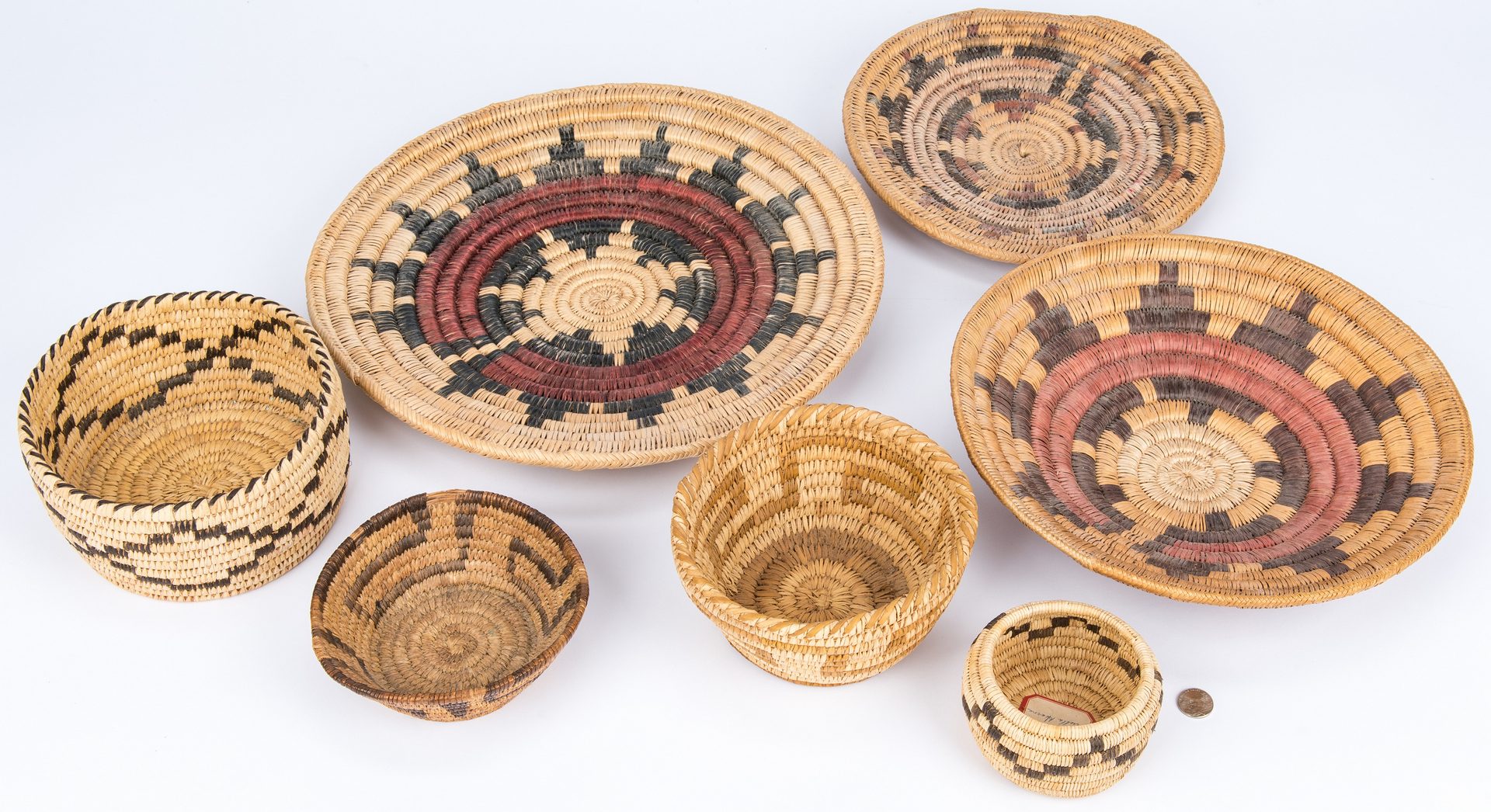 Lot 275: 9 Native American baskets, mostly Southwestern