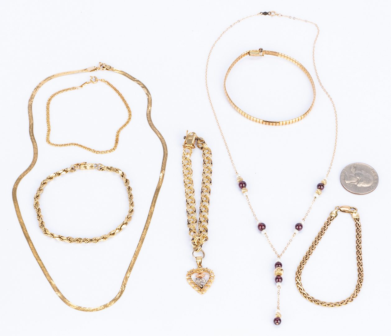Lot 38: Group seven 14k Gold Jewelry Items