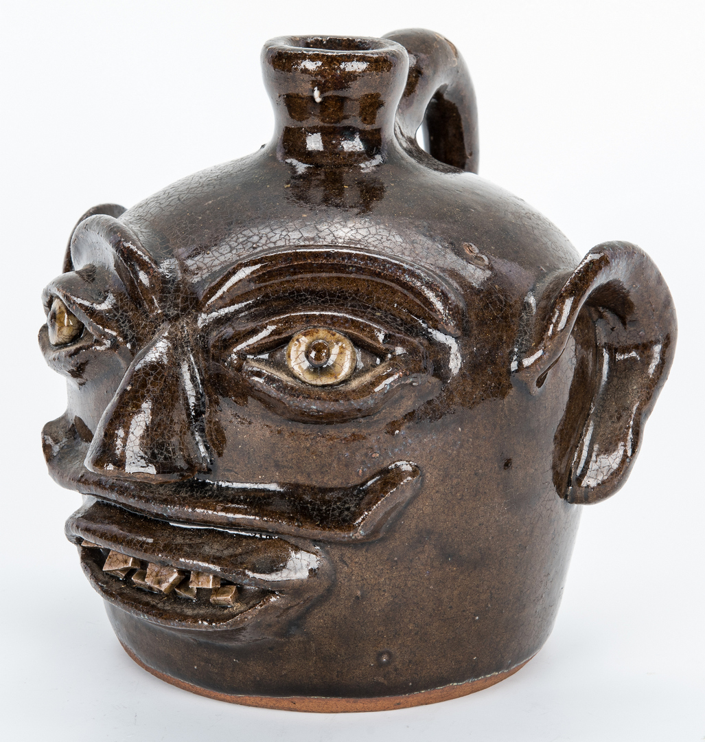Lot 174: NC Southern Pottery Face Jug, H. F. Reinhardt