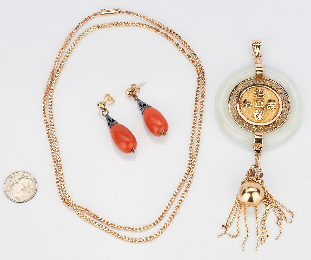 Lot 20: 18K jade pendant & chain with 14K coral earrings