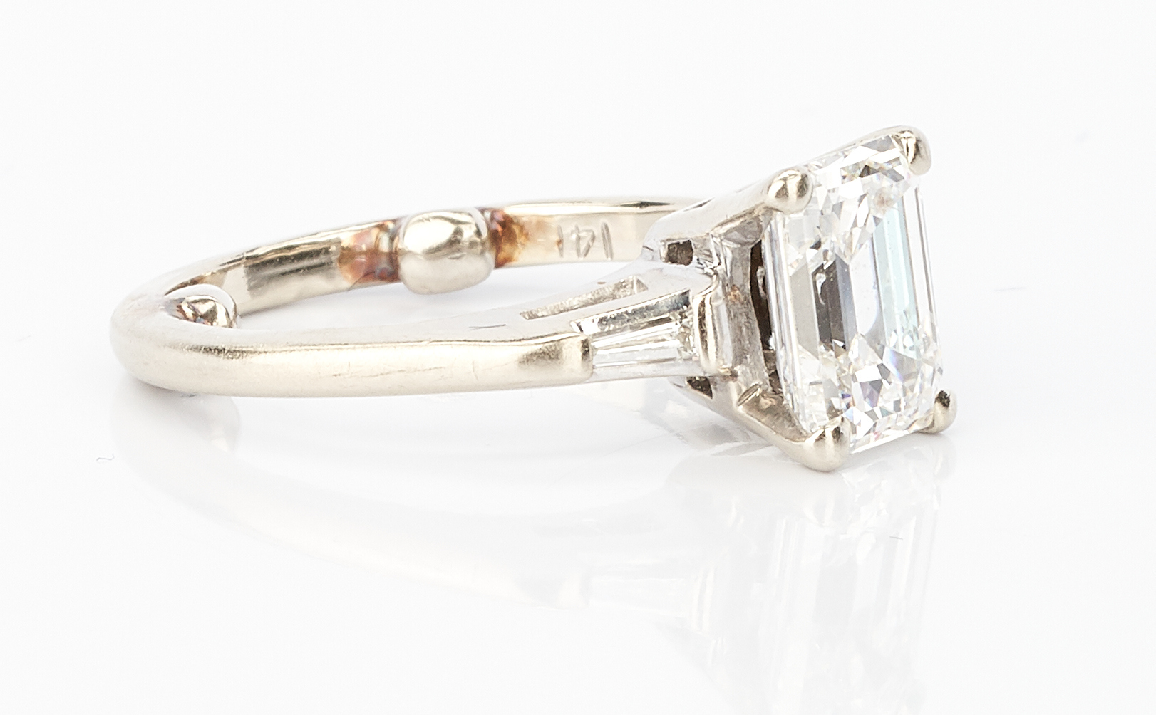 Lot 212: 14K 1 Carat Emerald Cut Diamond Engagement Ring