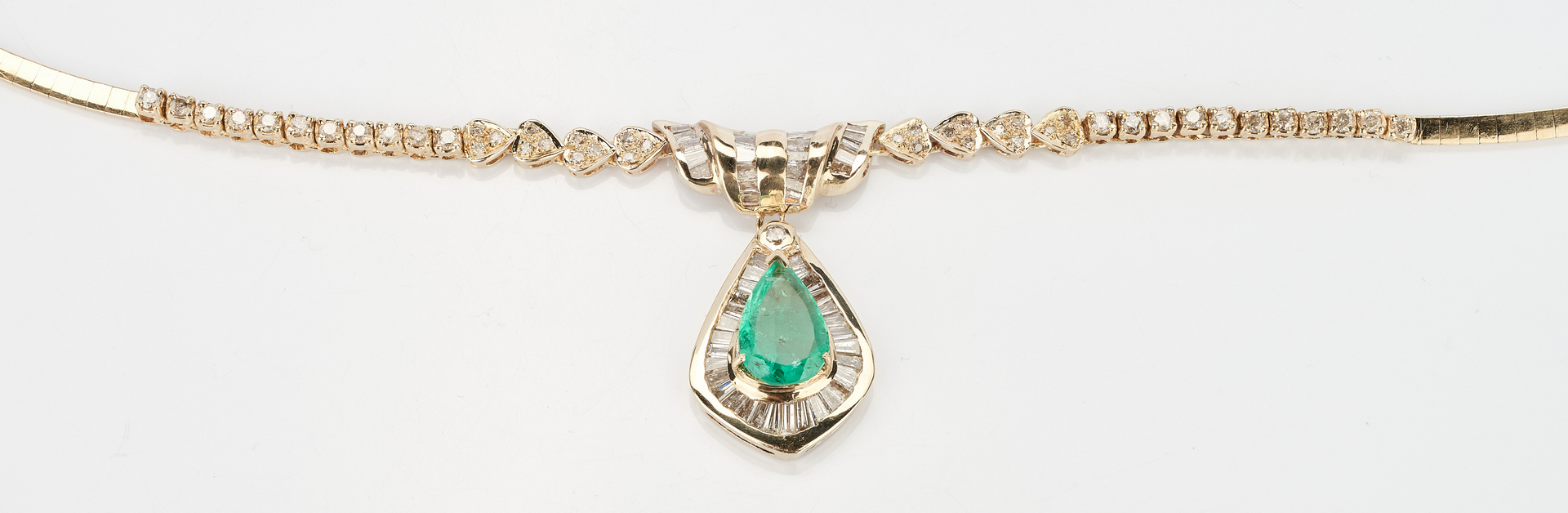 Lot 219: 14K 3.5 Carat Emerald and Diamond Necklace
