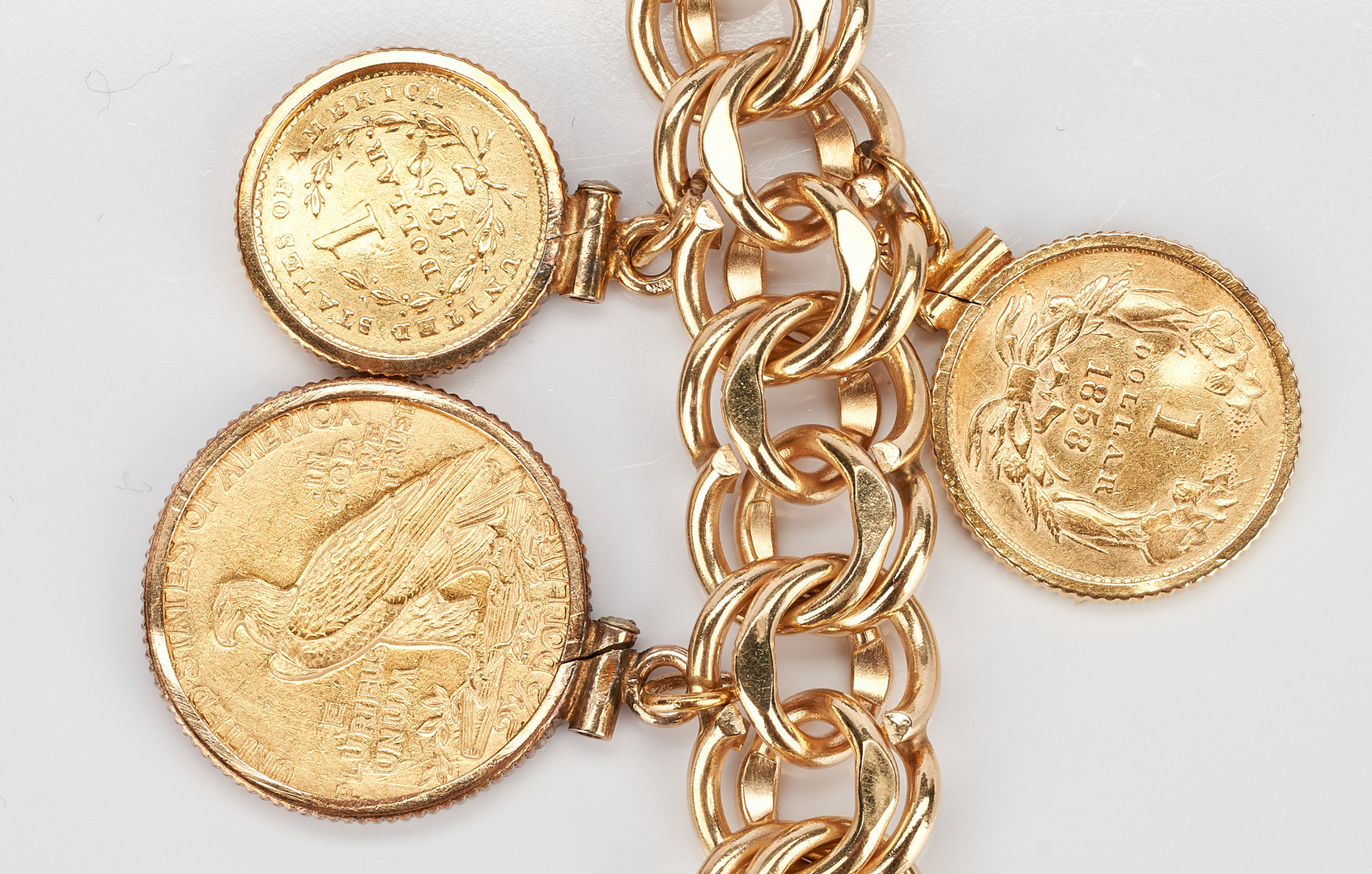 Lot 35: 14K Gold Charm Bracelet, 86.2 grams