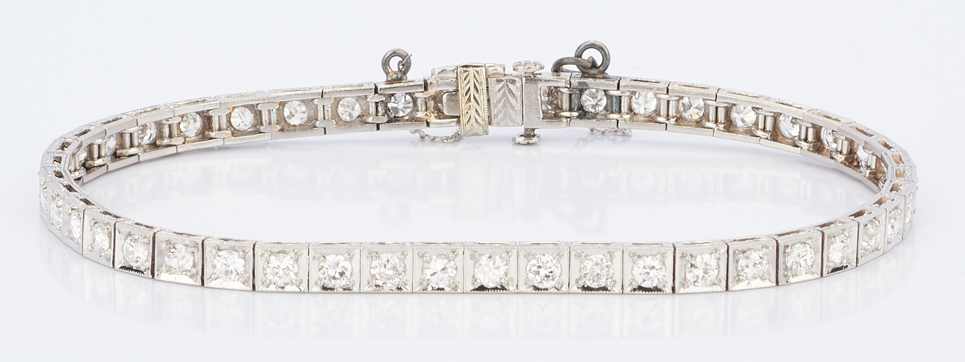Lot 409: Ladies Platinum & Diamond Line Bracelet
